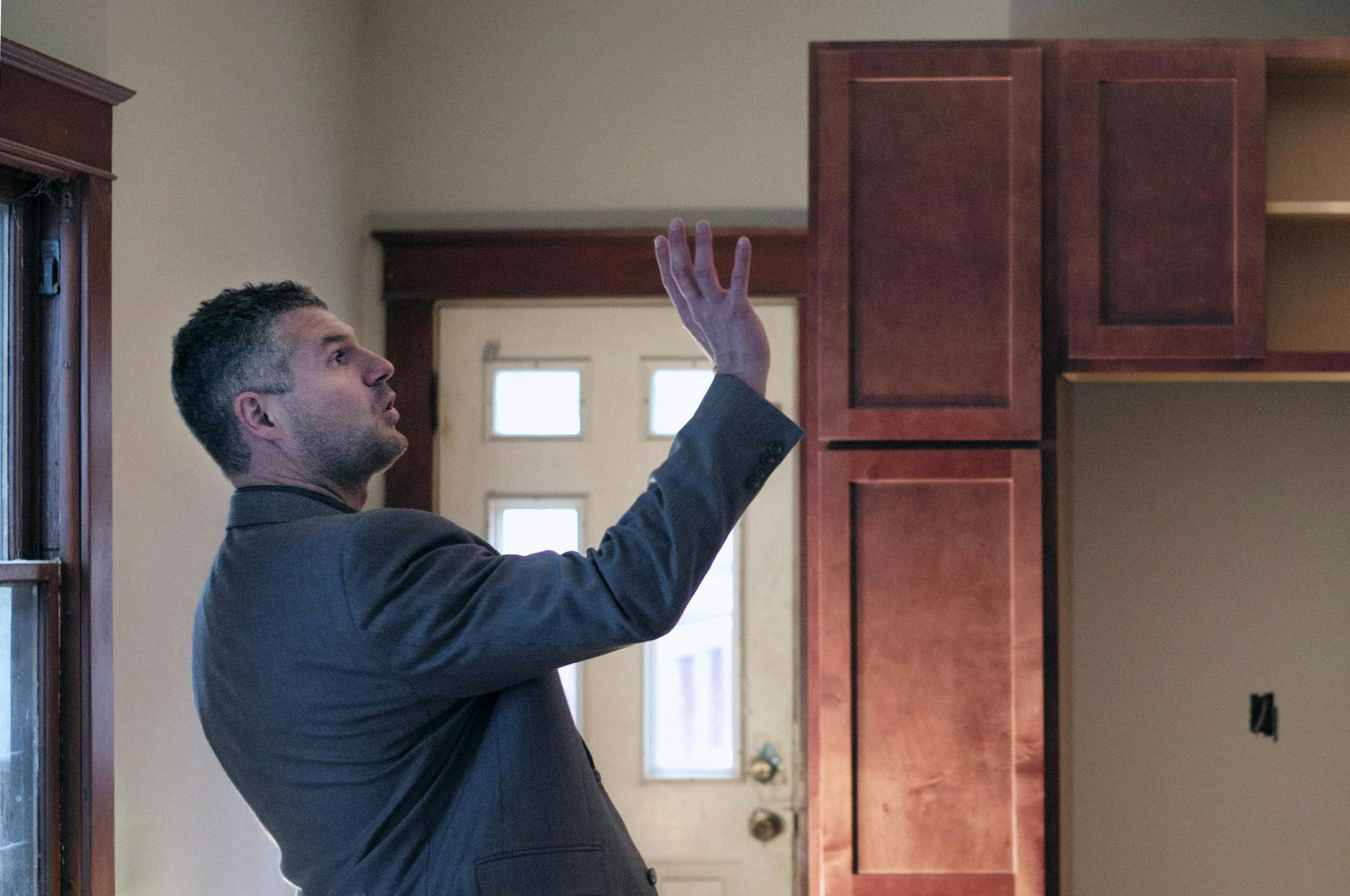 Jeremy Rupp is a real estate investor who pays cash for his houses, primarily because of the advantage it offers him during negotiaitons. He is working carpenter Mark Hefner during the rehab of this property.]richard tsong-taatarii/rtsong-taataarii@startribune.com ORG XMIT: MIN1310301250524788 ORG XMIT: MIN1310301327524809