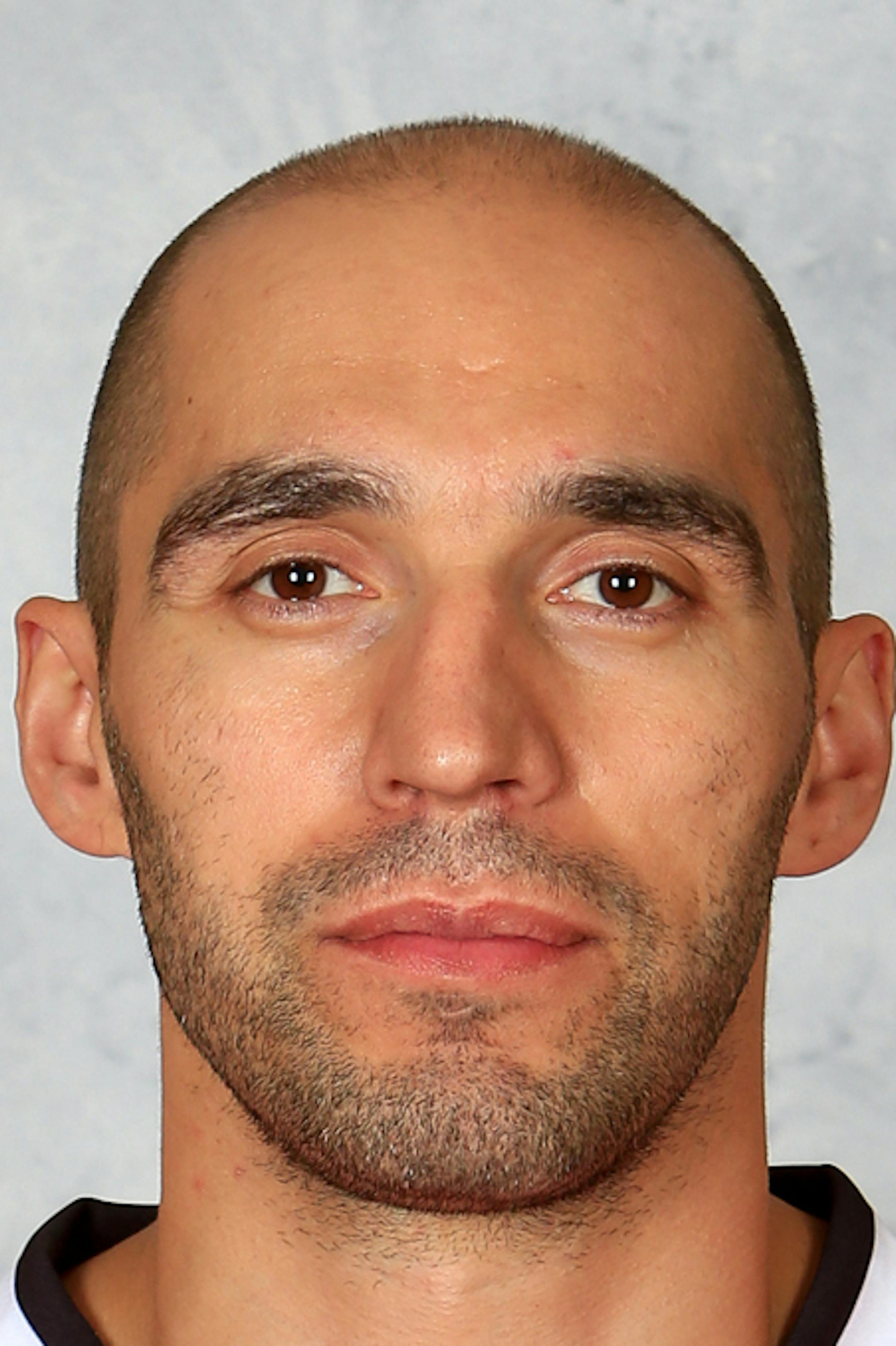CHICAGO, IL ‚Äì September 11: Michal Rozsival #32 of the Chicago Blackhawks poses for his official headshot for the 2013-2014 season on January 13, 2013 at the United Center in Chicago, Illinois. (Photo by Chase Agnello-Dean/NHLI via Getty Images)*** Local Caption *** Michal Rosiva ORG XMIT: 177614218