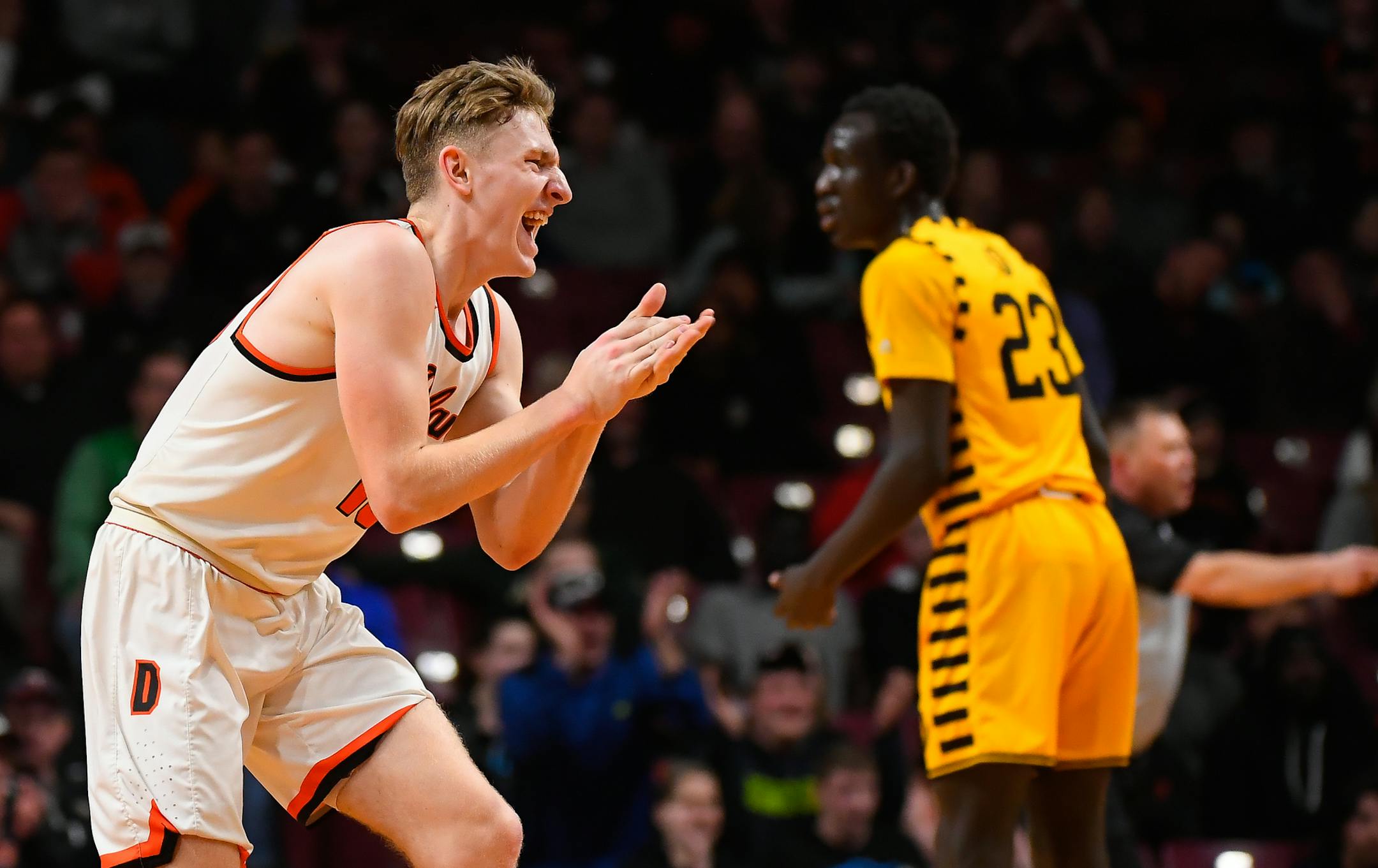 Delano guard Calvin Wishart (10) celebrated a 3-point basket by guard Derek Techam (5) in the first half, leading to a Mankato East timeout. ] AARON LAVINSKY ï aaron.lavinsky@startribune.com Delano played Mankato East in a Class 3A quarterfinal game on Wednesday, March 21, 2018 at Williams Arena in Minneapolis, Minn.