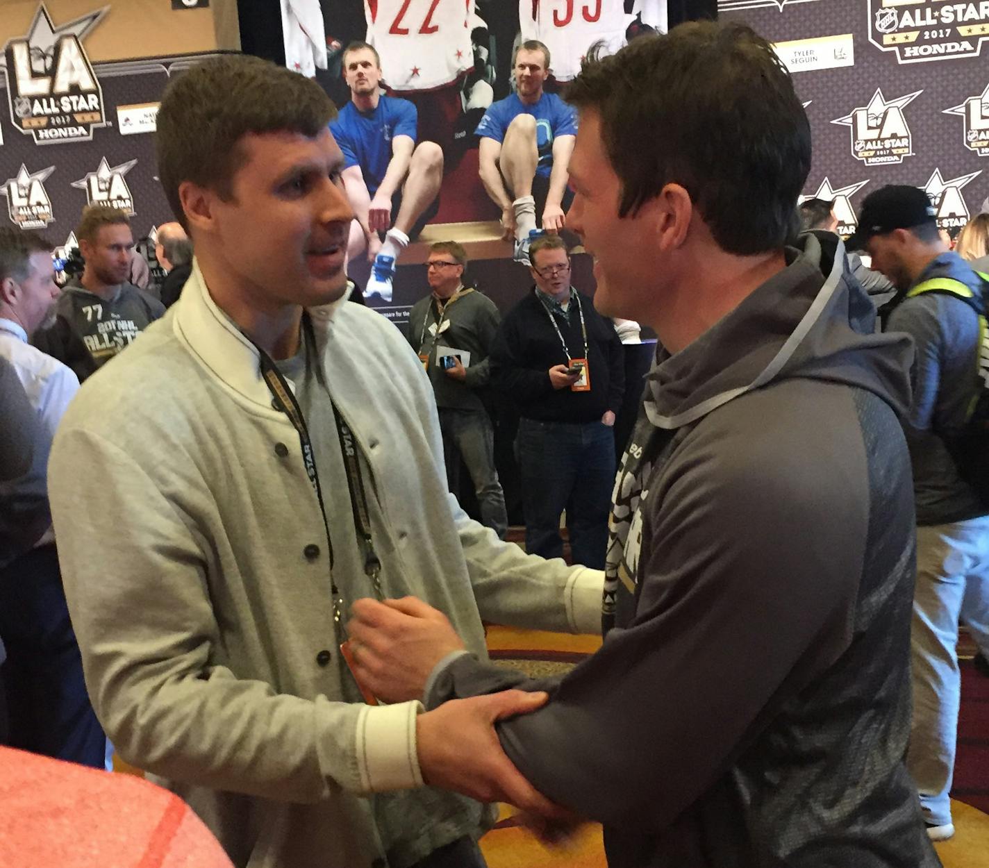 Ryan Suter (right) shakes hands with Ilya Bryzgalov on Saturday, January 28 during the NHL All-Star Game festivities. Photo by Michael Russo