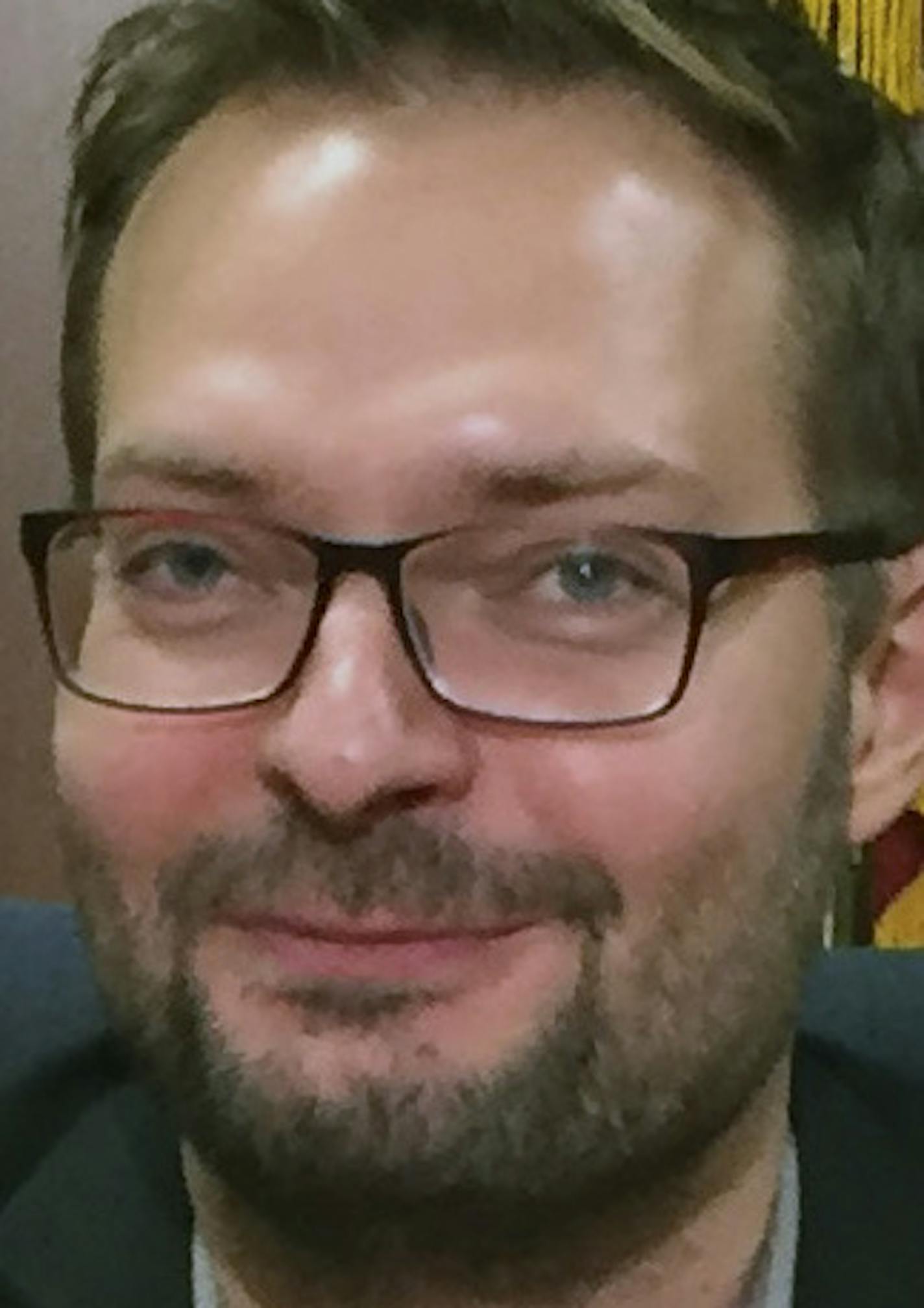 Daniel Koehler, who directs the German Institute on Radicalization and De-radicalization Studies in Stuttgart, Germany. poses for a photo, Wednesday, Sept. 21, 2016 in Minneapolis, Koehler, a German expert who evaluated six Minnesota men who pleaded guilty to trying to join the Islamic State group has developed counseling plans for each of them aimed at keeping them off the path of violence (AP Photo/Steve Karnowski)