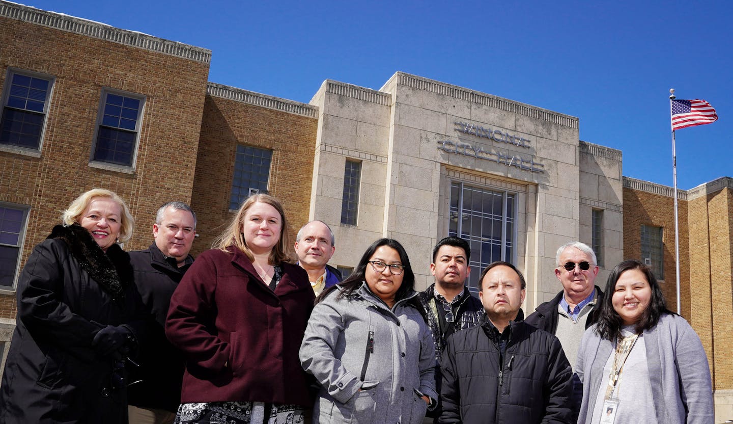 People who were instrumental in making Winona a welcoming place, from left, Fatima Said, Project Fine executive director; Steve Sarvi, Winona City Manager; Katie van Eijl, Project Fine staff manager; David Kramer, Project Fine board member; Paola Arevalo, German Victoria, Chong Sher Vang, Project Fine staff; Mark Peterson, Winona Mayor; Pang Vang, Project Fine staff.
Winona became the first Minnesota city to join the Welcoming America network on June 6, 2016. ] GLEN STUBBE &#x2022; glen.stubbe@s