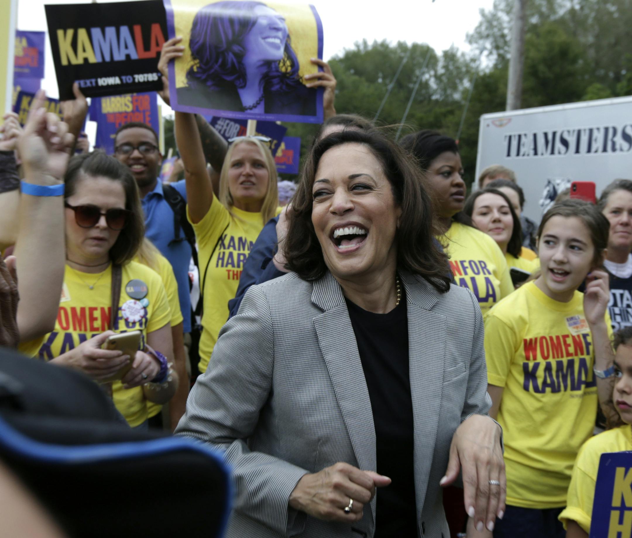 Democratic presidential candidate Sen. Kamala Harris, D-Calif. marches with her supporters at the Polk County Democrats Steak Fry, in Des Moines, Iowa, Saturday, Sept. 21, 2019. (AP Photo/Nati Harnik)