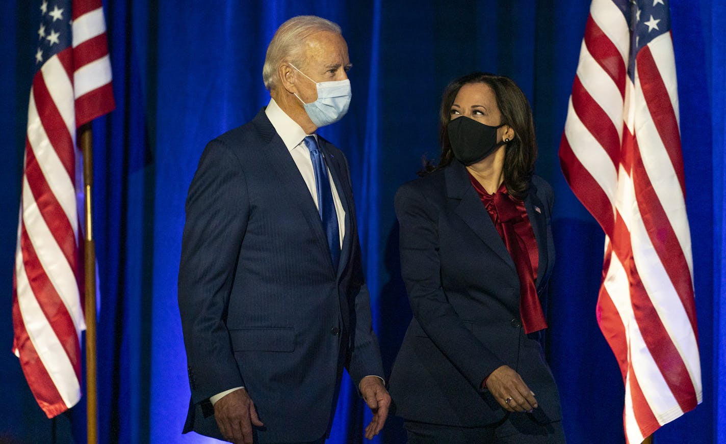 Democratic presidential candidate former Vice President Joe Biden and Democratic vice presidential candidate Sen. Kamala Harris, D-Calif., arrive before Biden speaks, Friday, Nov. 6, 2020, in Wilmington, Del. (AP Photo/Carolyn Kaster)