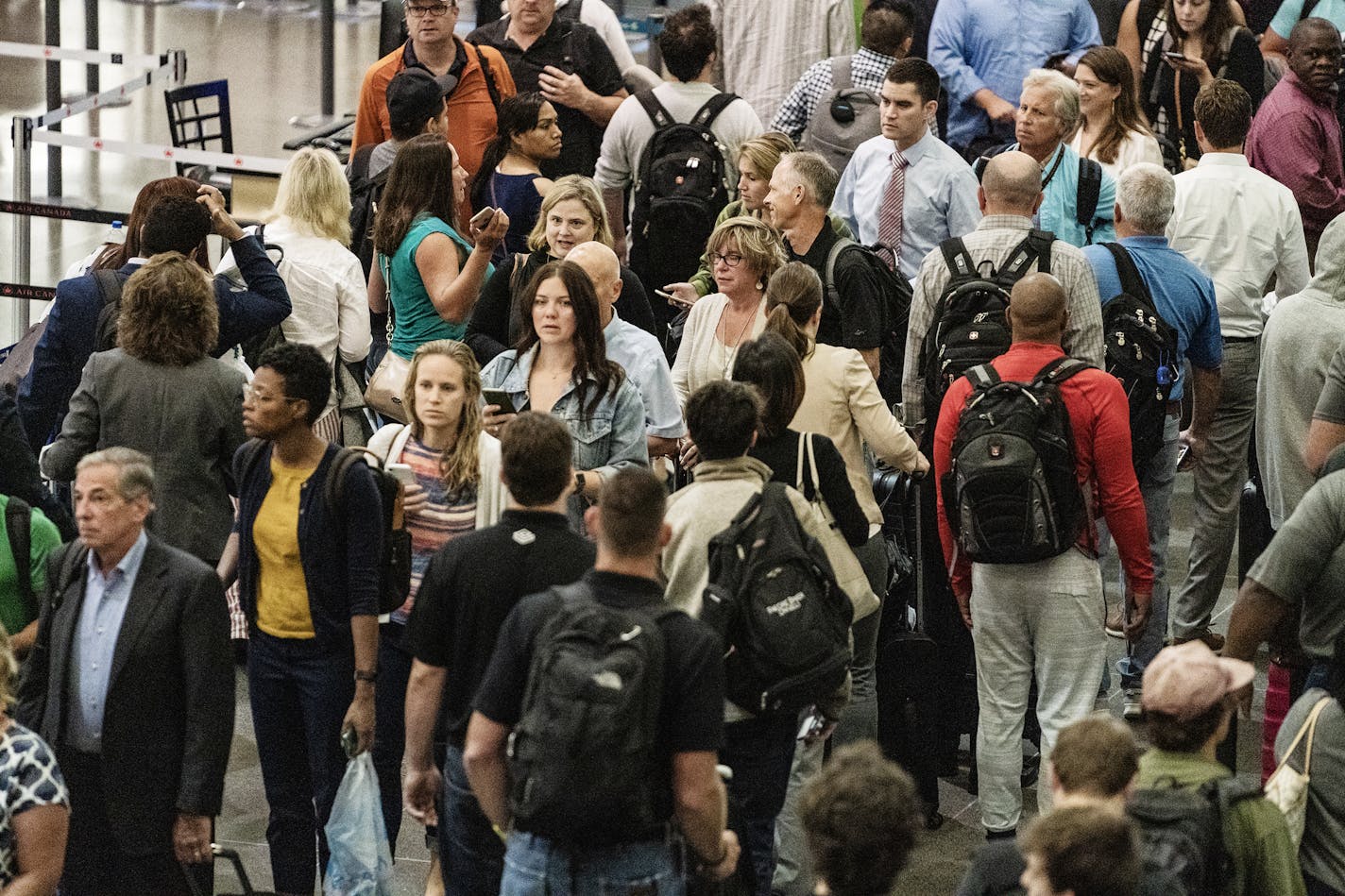 Lines were long right before 6 am regardless of whether people were headed to the North or South checkpoint.] Everybody without PreCheck goes through one checkpoint at MSP Airport's main terminal starting Monday. That'll make for a crowd at the North checkpoint in the morning, which is a particularly busy time at the airport. The crunch comes because the south checkpoint will be under construction and limited to people with Precheck status. RICHARD TSONG-TAATARII &#xa5; richard.tsong-taatarii@st