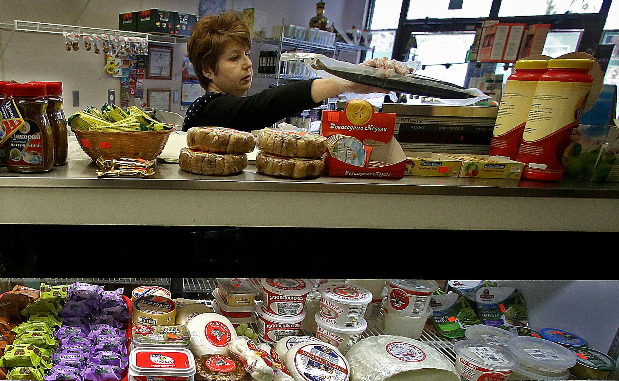 The Russian speaking population in Minnesota has peaked at an estimated 50,000, with many calling the west metro area their home. A strip mall in Plymouth has come to be dubbed &#x201a;&#xc4;&#xfa;Little Russia,&#x201a;&#xc4;&#xf9; for its concentration on one side of Russian businesses. Among the shops is Fruit and Fish, a Russian Deli, where cashier Inessa Shapiro waited on a customer. ] JIM GEHRZ &#x201a;&#xc4;&#xa2; jgehrz@startribune.com / Plymouth, MN / December 14, 2013 / 11:00 AM - BACKG