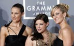FILE - In this Feb. 11, 2007, file photo, the Dixie Chicks, Emily Robison, left, Natalie Maines, center, and Martie Maguire, who earned five Grammy no