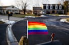 A pride flags sit on a neighbor's mailbox near Casey Handal and Zadette Rosado's home in Barrington on Dec. 19, 2018. (Armando L. Sanchez/Chicago Trib