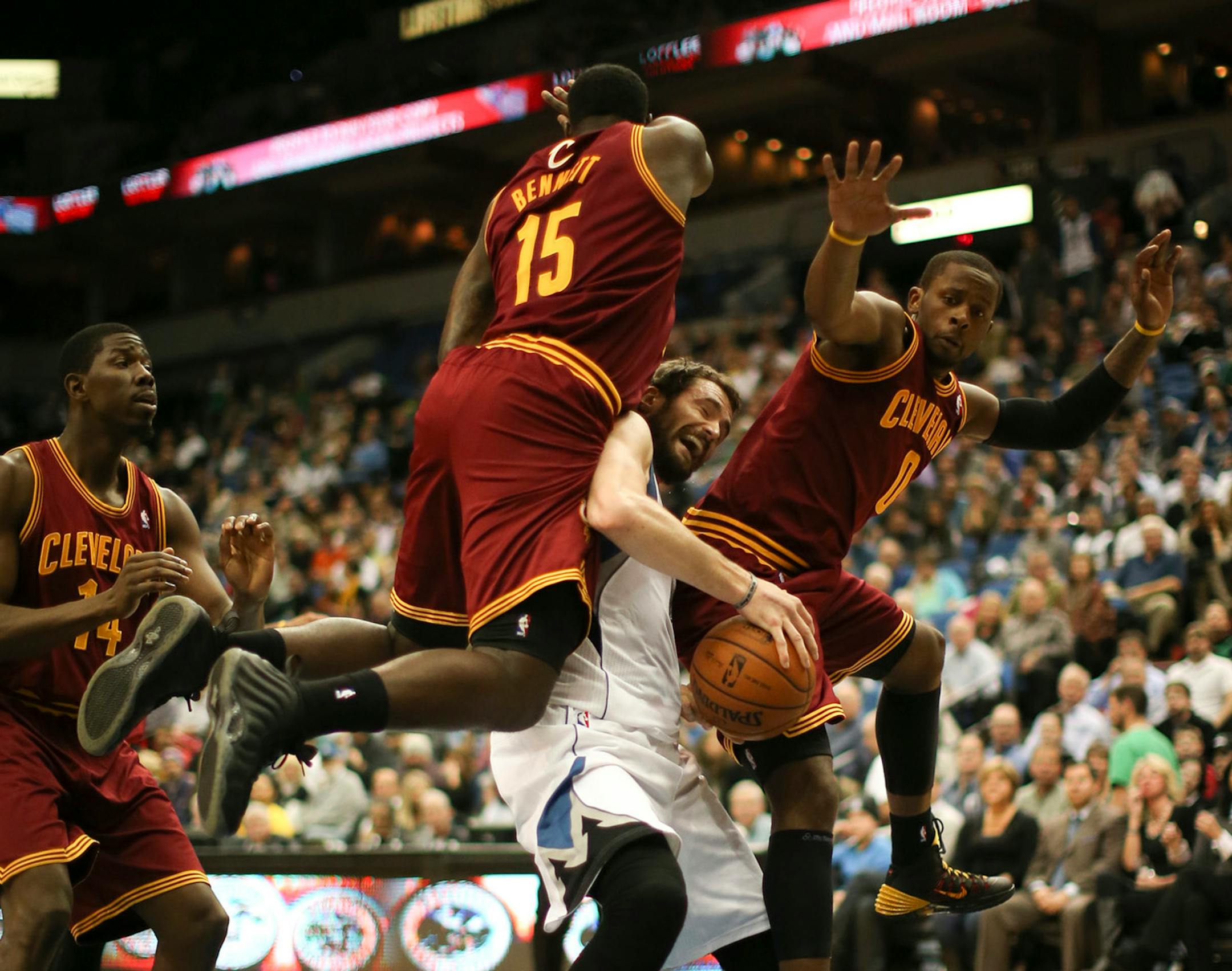 The Minnesota Timberwolves faced the Cleveland Cavaliers in an NBA game Wednesday night, November 13, 2013 at Target Center in Minneapolis. Minnesota Timberwolves power forward Kevin Love (42) was the landing pad for Cleveland Cavaliers small forward Anthony Bennett (15) and Cleveland Cavaliers shooting guard C.J. Miles (0) under the rim in the second quarter. ] JEFF WHEELER ‚Ä¢ jeff.wheeler@startribune.com