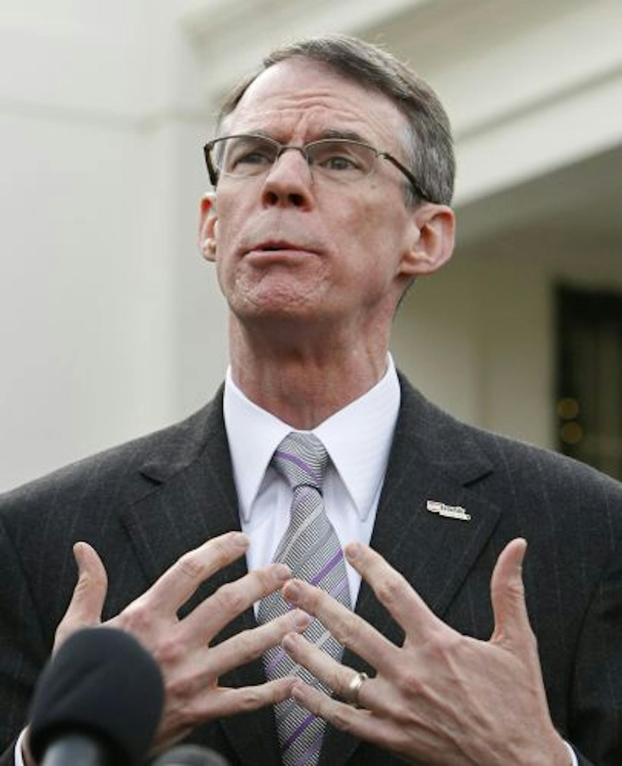 US Bancorp Chief Executive Officer Richard Davis speaks to reporters outside the West Wing of the White House in Washington, Monday, Dec. 14, 2009, after he and other bank chief executive officers met with President Barack Obama.
