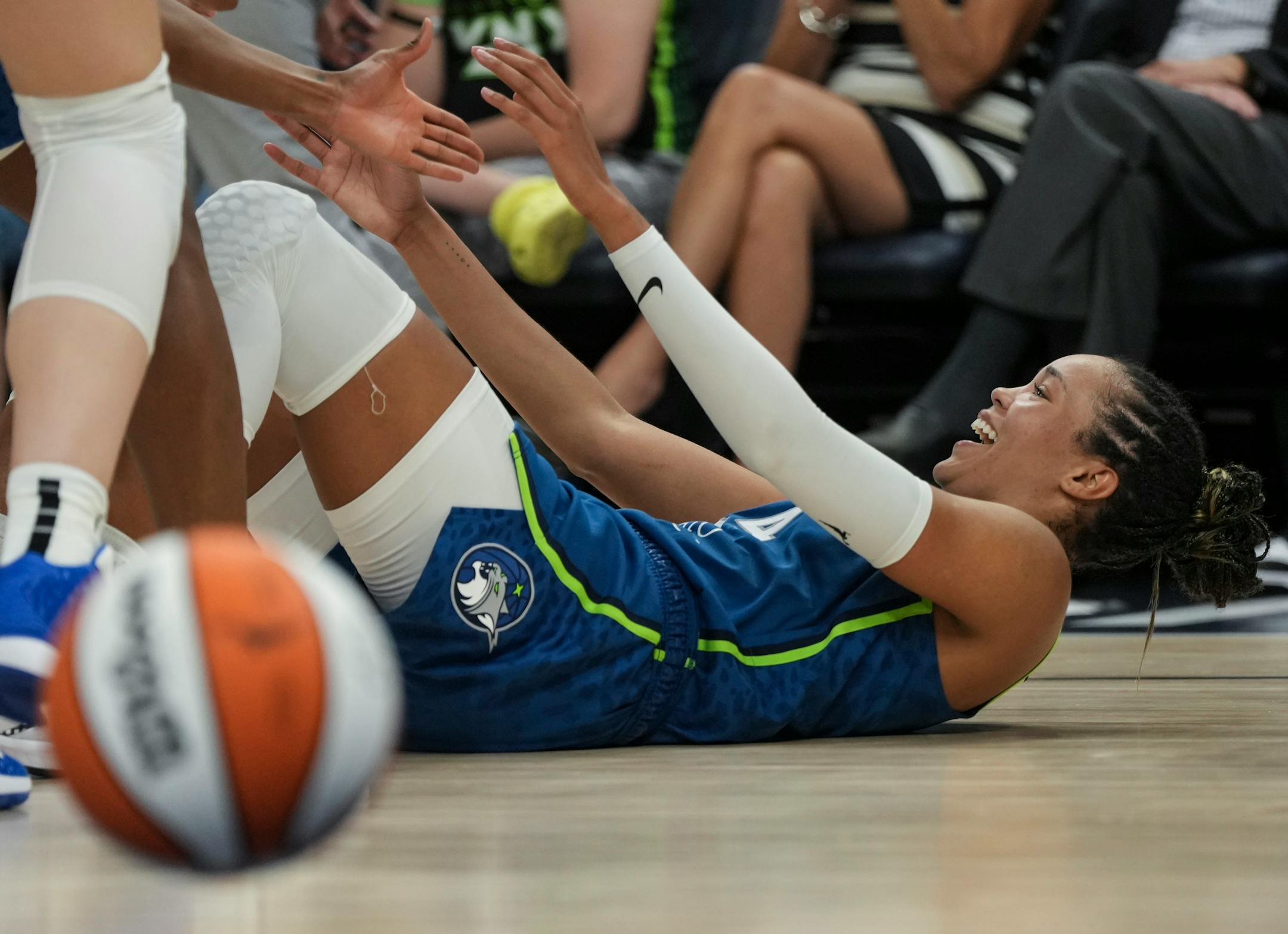 Minnesota Lynx forward Napheesa Collier (24) gets a hand from a teammate after scoring and getting a free throw in the second half. Collier scored 33 points in the game. The Minnesota Lynx defeated the Seattle Storm 104-93 on Tuesday, June 27, 2023 at the Target Center in Minneapolis.