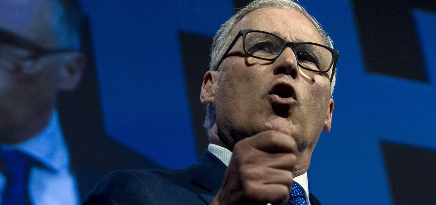 Democratic presidential candidate Washington Gov. Jay Inslee, speaks during the We the People Membership Summit, featuring the 2020 Democratic presidential candidates, at the Warner Theater, in Washington, Monday, April 1, 2019. (AP Photo/Jose Luis Magana)