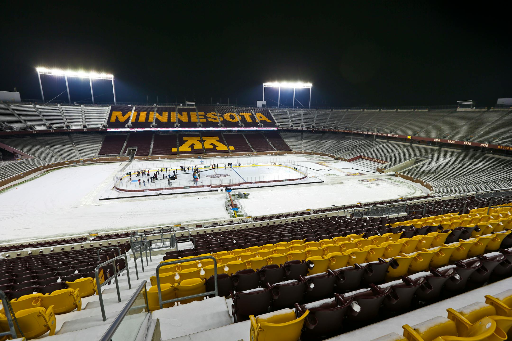 A crowd of people got a chance to skate around the rink built in TCF Bank Stadium for the Hockey City Classic. (Renee Jones Schneider, Star Tribune)