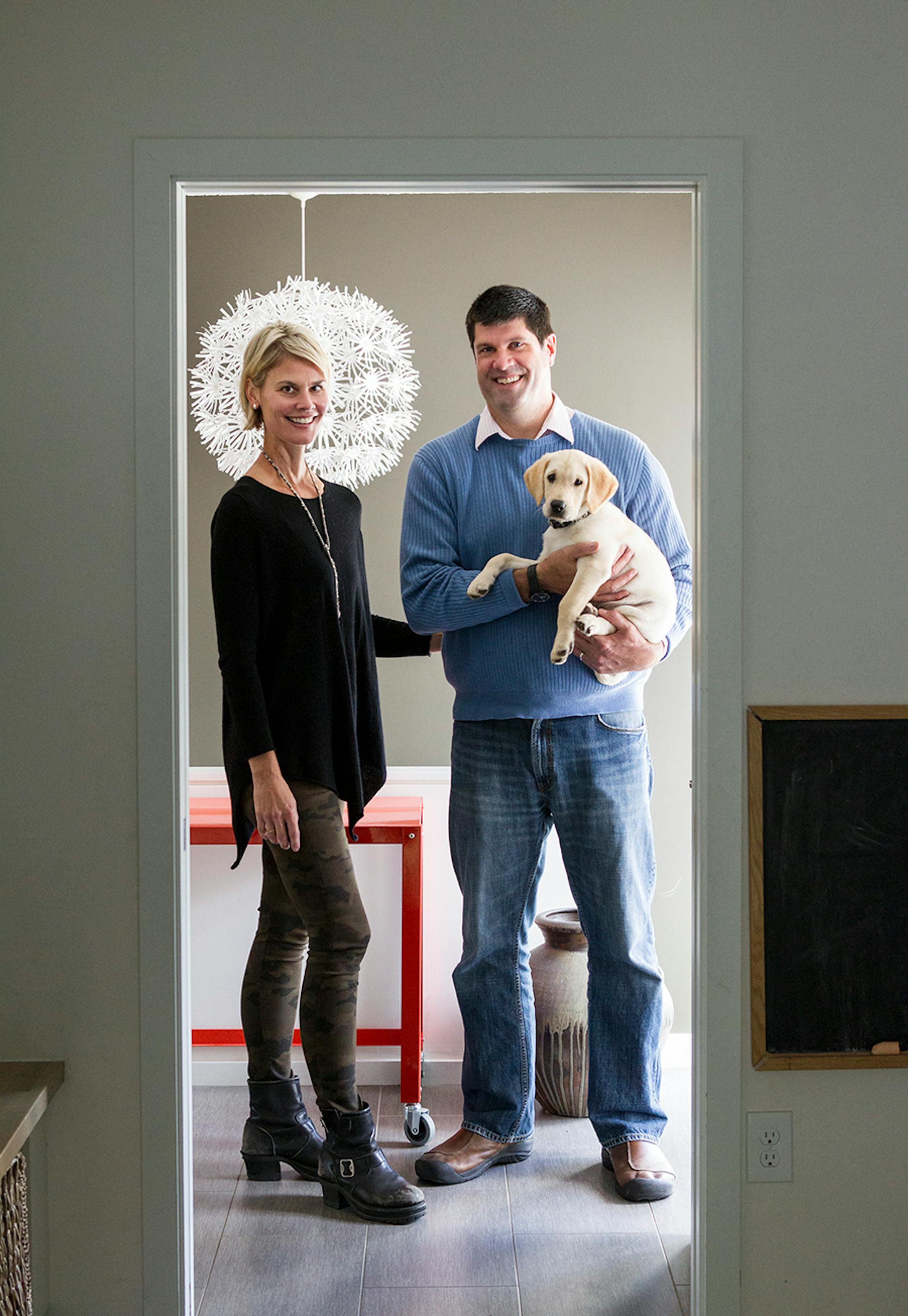 Mara and Brian Winke, holding Humphrey, revitalized their 1970s residence.