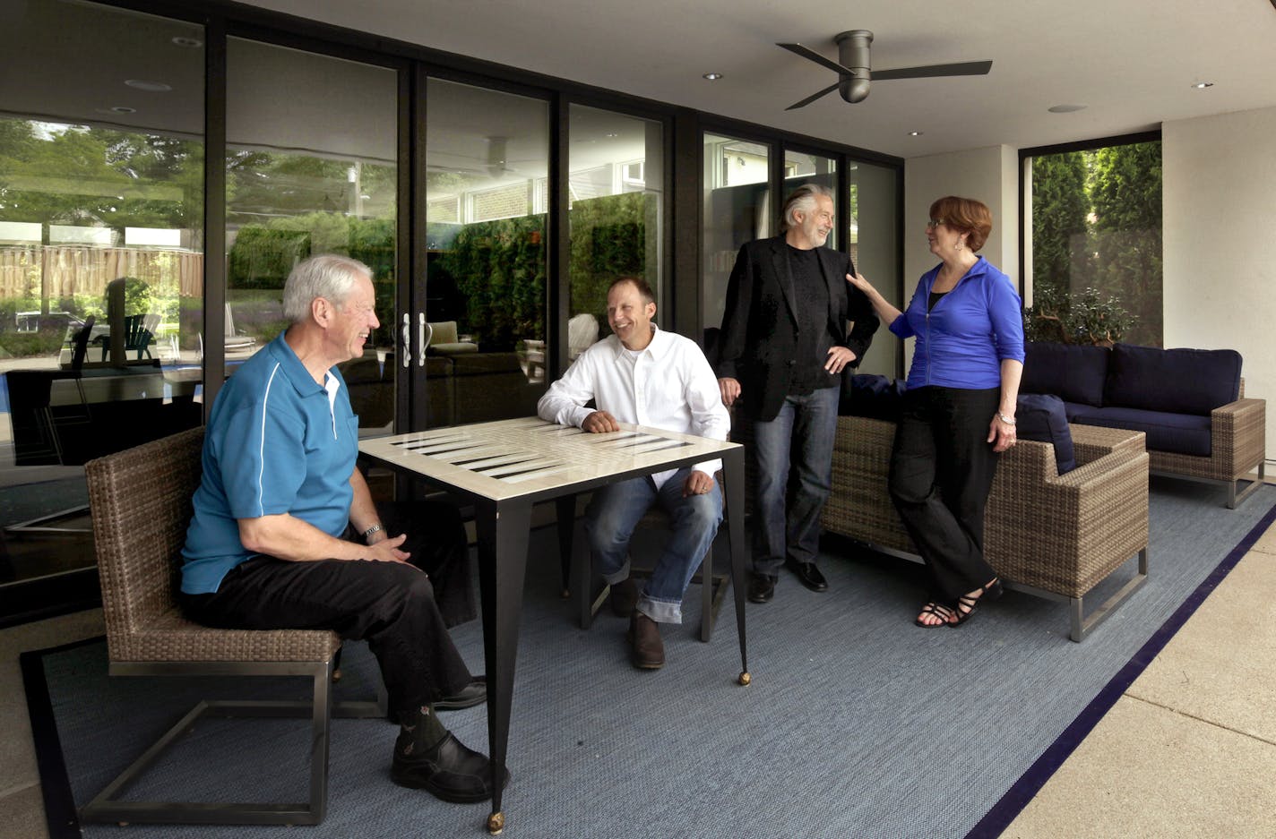 Left to right:Homeowner Lee Larson, Jason Stinson, architect Charles Stinson and Karen Stinson, Charles' sister.