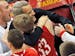 Lakeville North head coach John Oxton hugged J.P. Macura at the final horn. ] Class 4A Boys State Basketball Tournament - Hopkins Royals vs. Lakeville