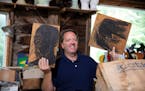 "Legacy List" host Matt Paxton holds up pieces from artist David Hayes at his studio in Coventry, Conn., in an episode from season two of the show. MU