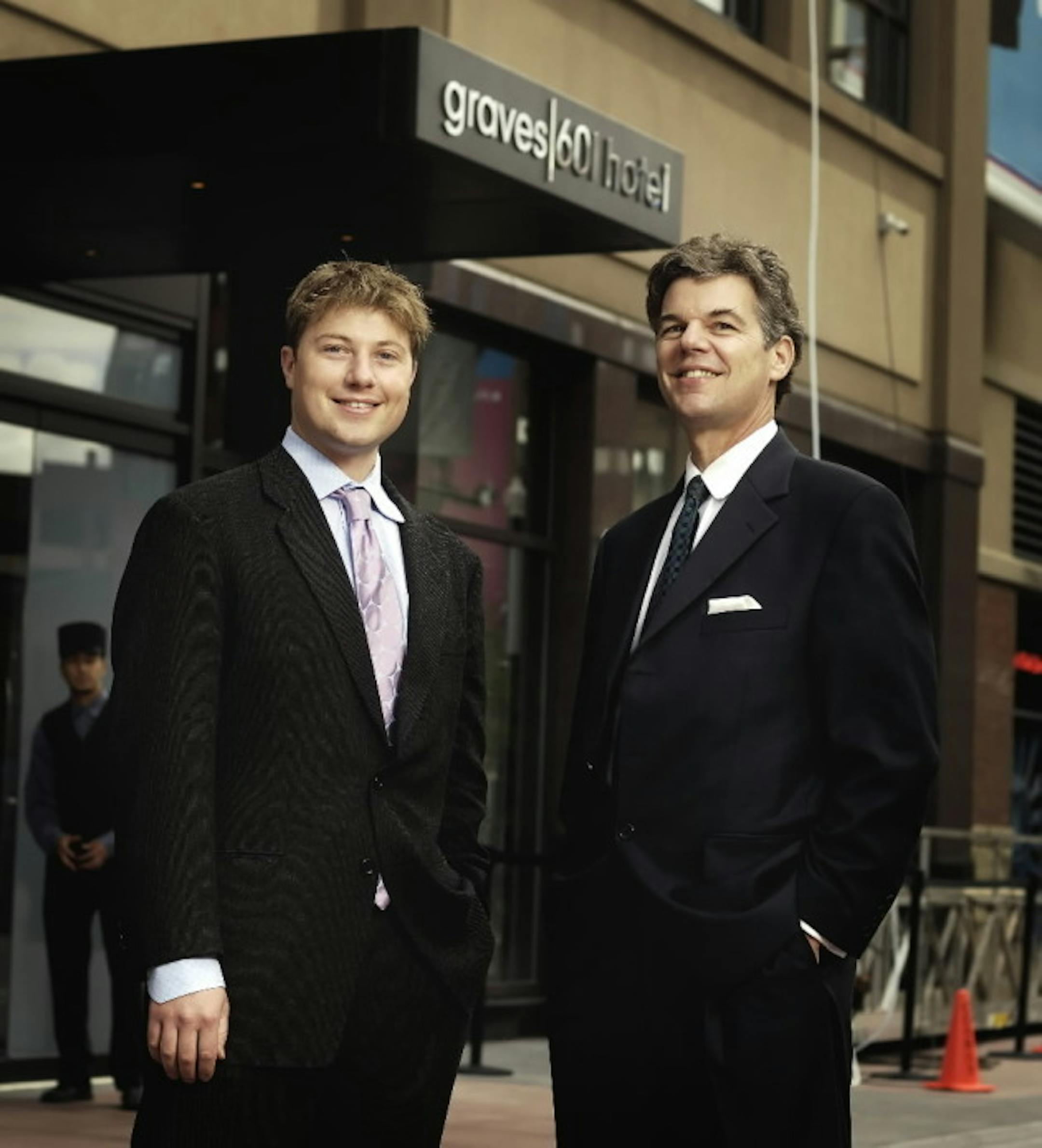 Jim Graves, with his son Ben, two years ago as the Minneapolis hotel was renamed Graves 601