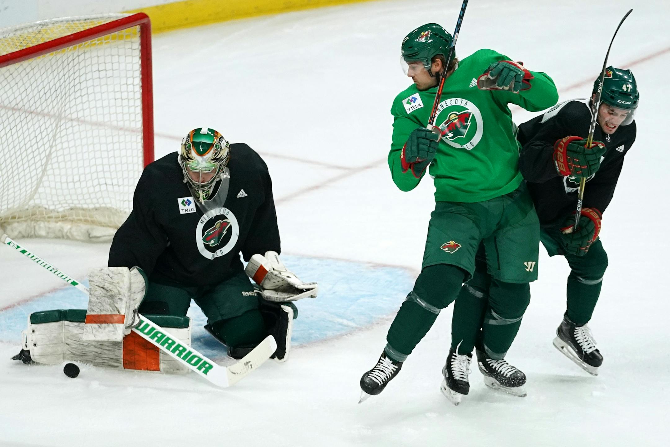 Minnesota Wild left wing Marcus Foligno (17) looked back as he tried to deflect the puck in.