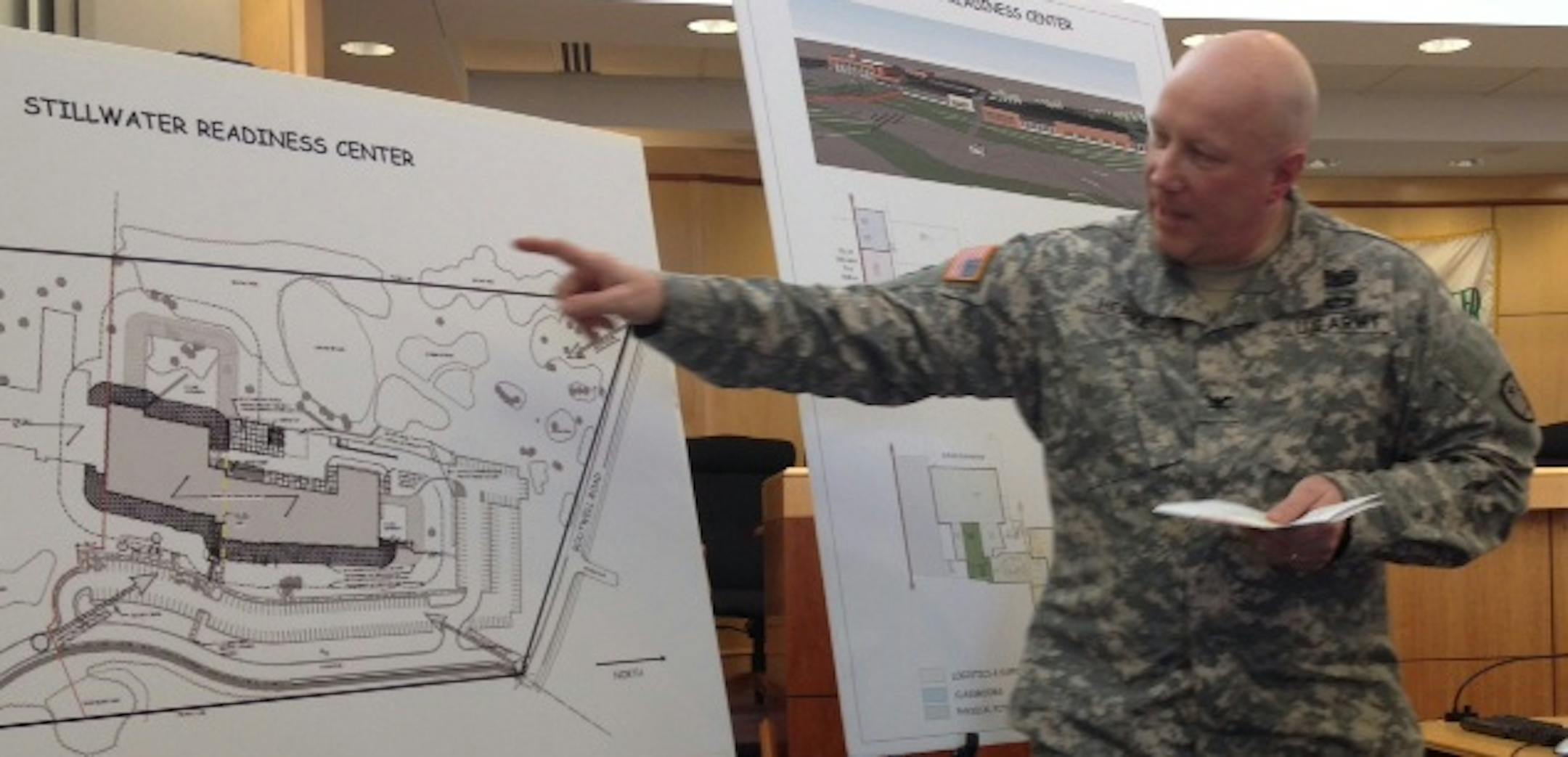 National Guard Col. Larry Herke explains building plans for a new armory in Stillwater. The current armory was built in 1922.