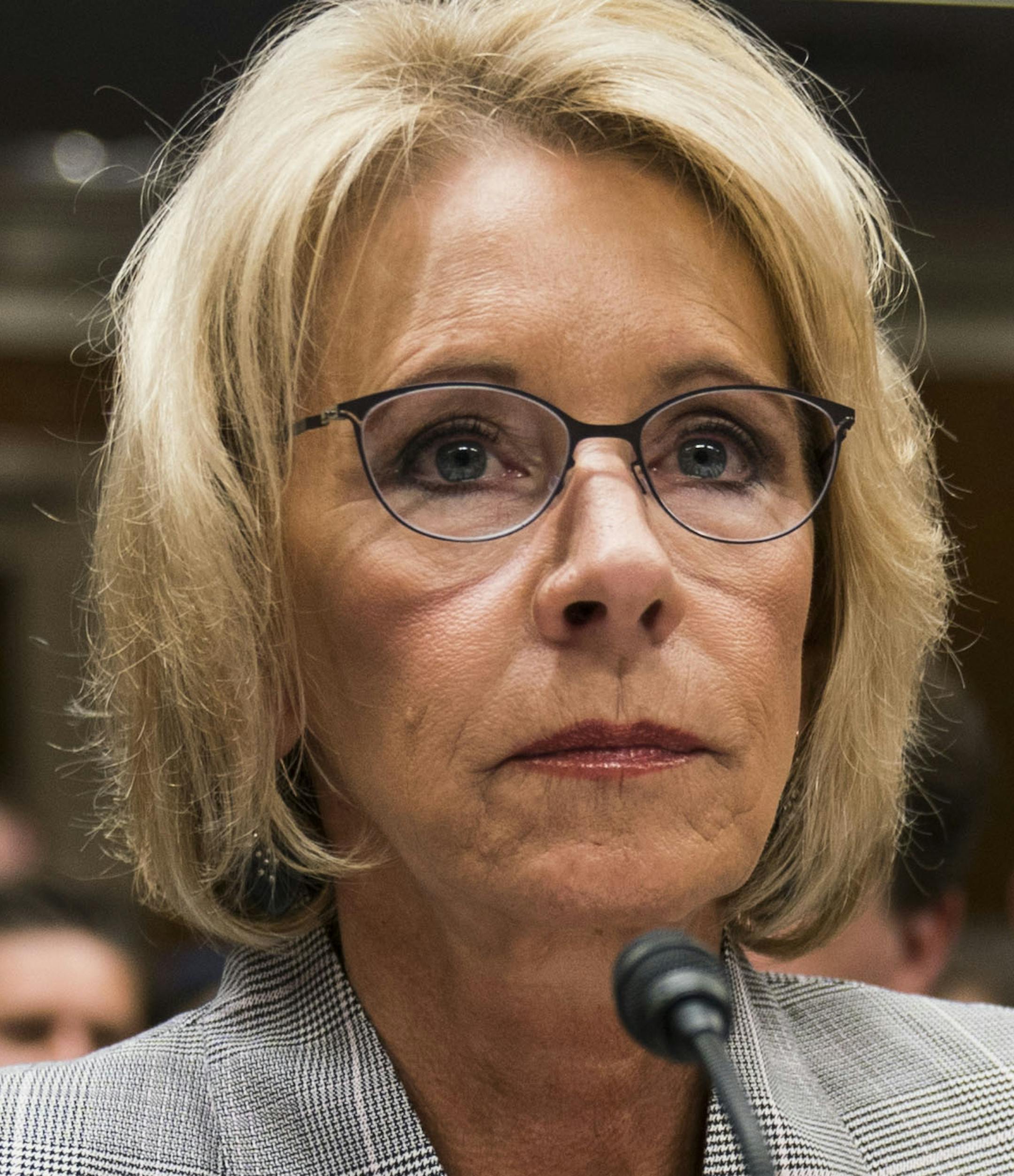 FILE-- Education Secretary Betsy DeVos testifies before a subcommittee of the House Appropriations Committee on Capitol Hill, in Washington, June 6, 2017. The Massachusetts attorney general filed a lawsuit on July 6 against the Education Department and DeVos, challenging the department&#x2019;s move last month to freeze new rules for erasing the federal loan debt of student borrowers who were cheated by colleges that acted fraudulently. (Doug Mills/The New York Times)