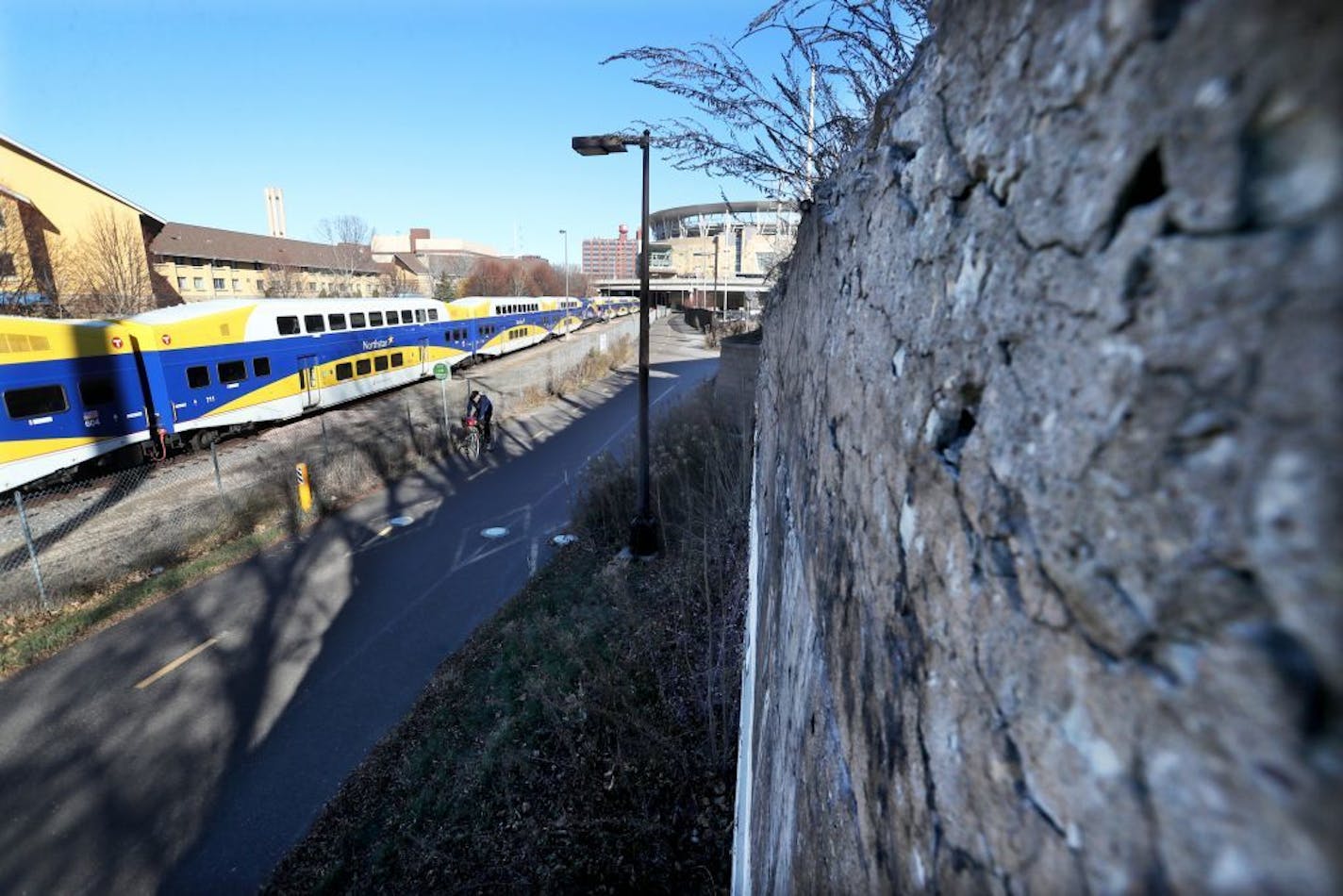 A mile-long swath of freight right of way west of Target field is "historic." It is now home to a city gravel operation, and runs along the Cedar Lake bike trail and Bryn Mawr Meadows. Here, a portion of a retaining wall considered historic on a portion of the stretch and seen Tuesday, Nov. 28, 2017, in Minneapolis MN.