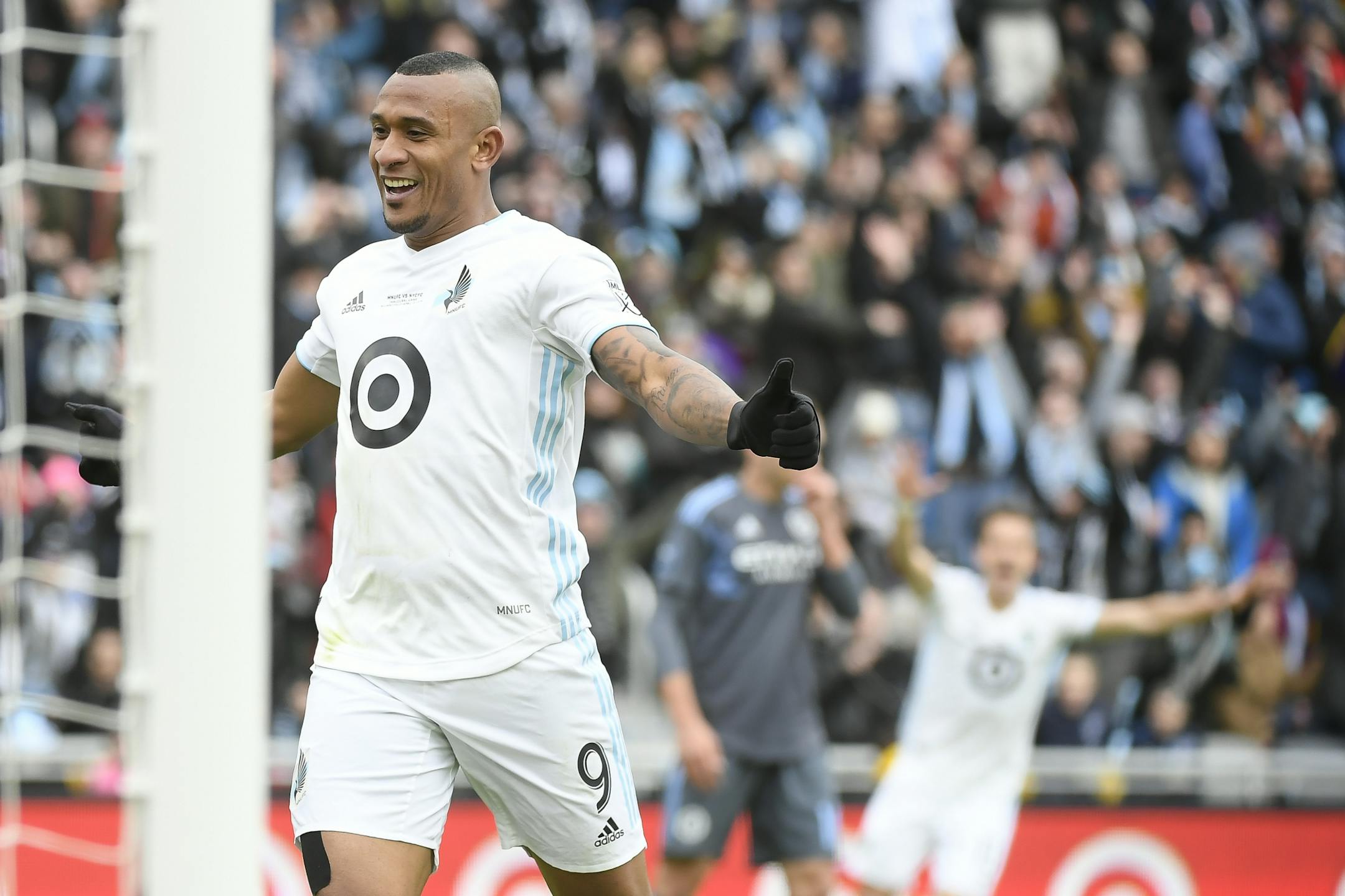 Minnesota United forward Angelo Rodriguez (9) celebrated after NYC FC goalkeeper Sean Johnson (1) scored an own goal in the first half.