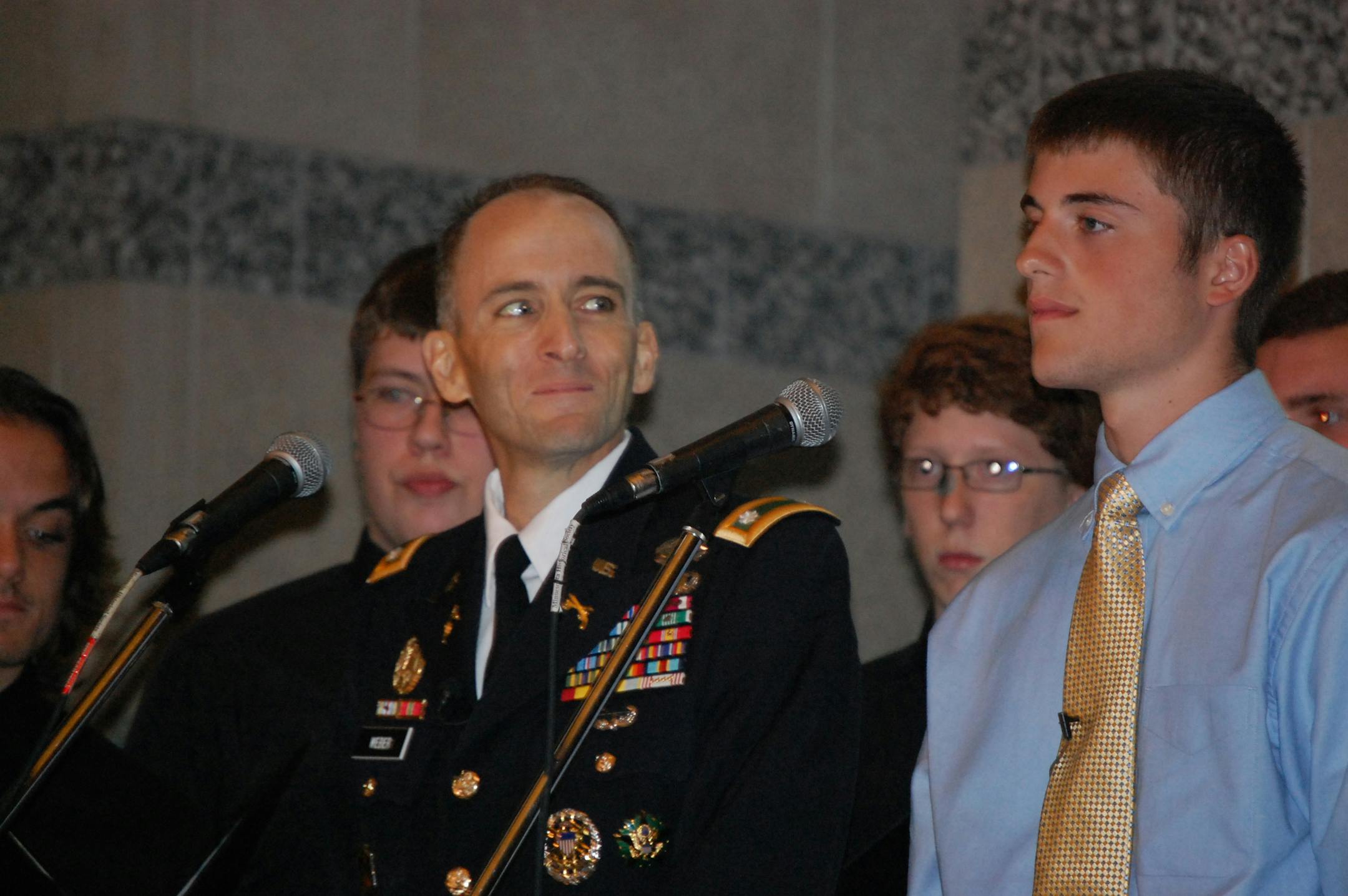 After delivering a speech marking the U.S. Army's 237th birthday last week, Lt. Col. Mark Weber stood with his son Matthew, 16, to sing an emotional duet at the Minnesota History Center in St. Paul.