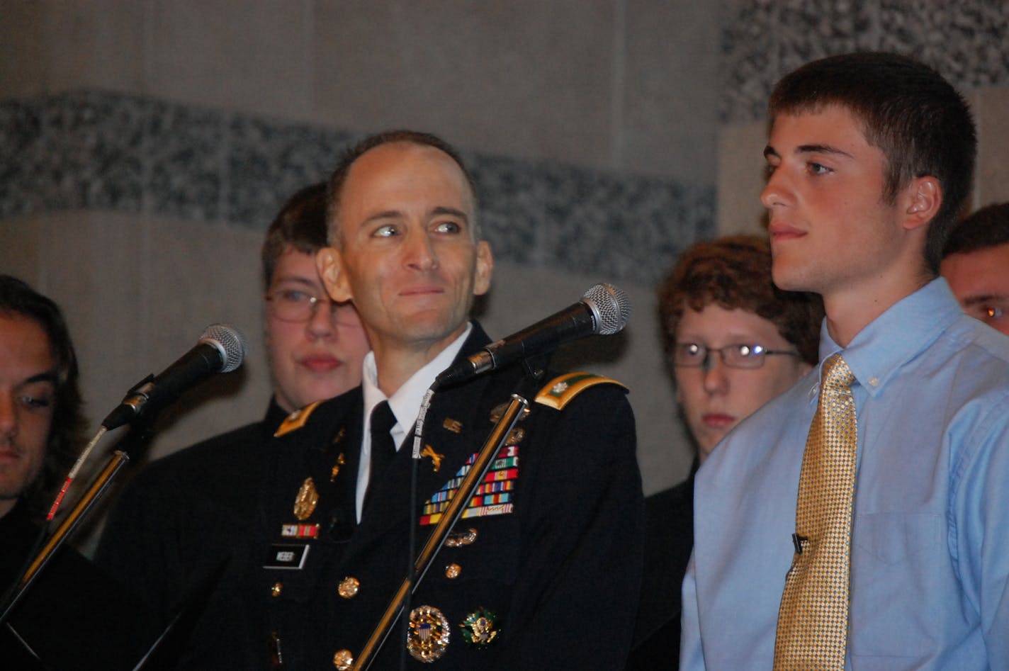 After delivering a speech marking the U.S. Army's 237th birthday last week, Lt. Col. Mark Weber stood with his son Matthew, 16, to sing an emotional duet at the Minnesota History Center in St. Paul.