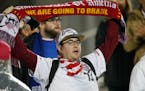 A United States fan held up a scarf during the first half of a CONCACAF Olympic qualifying soccer match between the U.S. and Panama on Tuesday in Comm