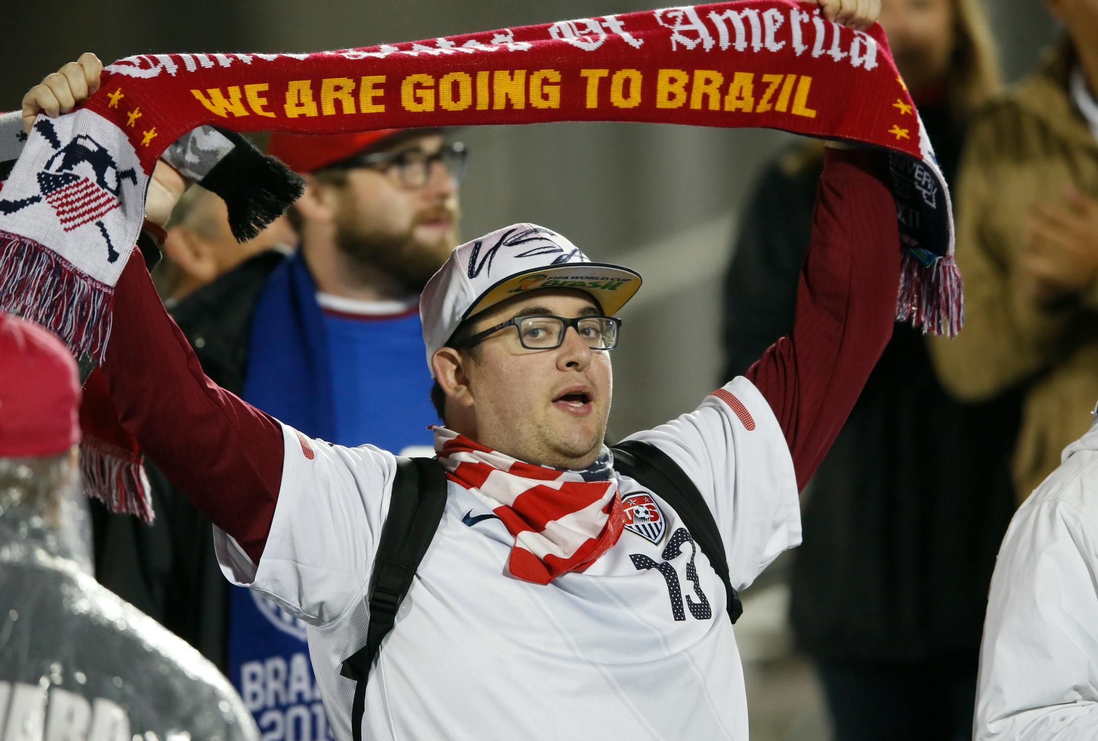 A United States fan held up a scarf during the first half of a CONCACAF Olympic qualifying soccer match between the U.S. and Panama on Tuesday in Commerce City, Colo. The U.S., after a sluggish start, won 4-0.