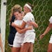 Orono's Claire Bash left celebrated her second half goal with Lily McKown at Husky Stadium November 4, 2015 in St. Cloud, MN. Orono beat Mahtomedi 2-0