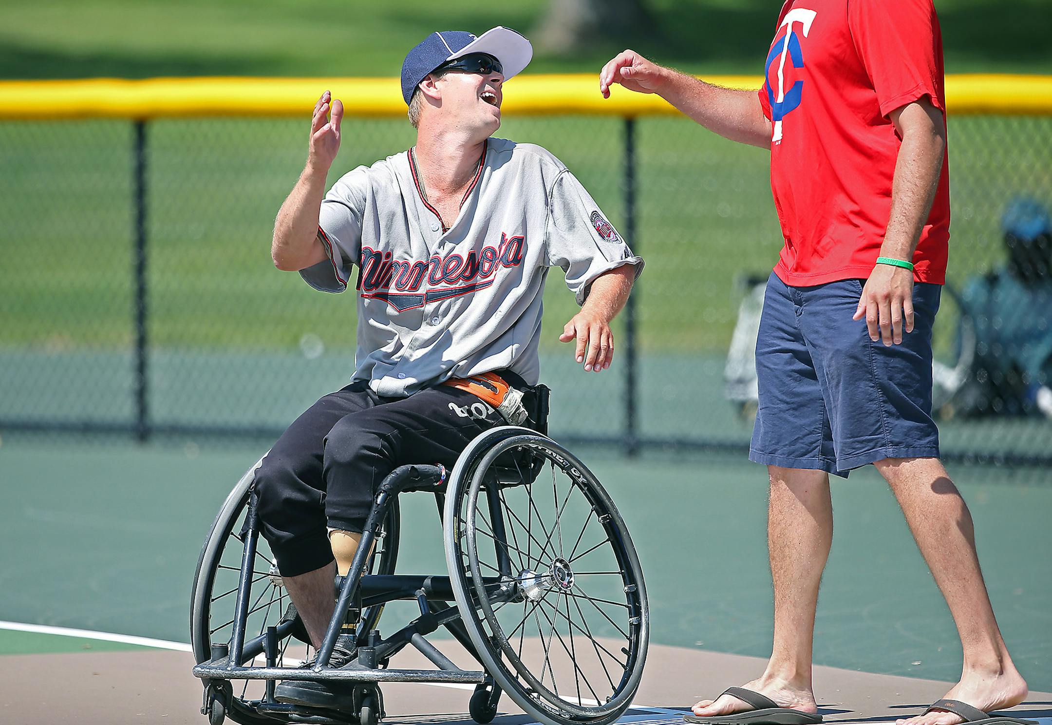 Minnesota Rolling Twins' Even Thorne celebrated his hit during the first round of play in the Wheelchair Softball World Series, Thursday, August 14, 2014. ] (ELIZABETH FLORES/STAR TRIBUNE) ELIZABETH FLORES • eflores@startribune.com