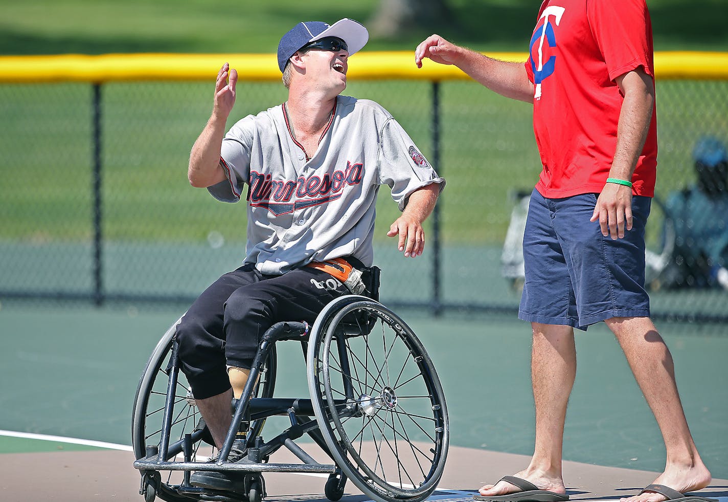 Minnesota Rolling Twins' Even Thorne celebrated his hit during the first round of play in the Wheelchair Softball World Series, Thursday, August 14, 2014. ] (ELIZABETH FLORES/STAR TRIBUNE) ELIZABETH FLORES &#x2022; eflores@startribune.com