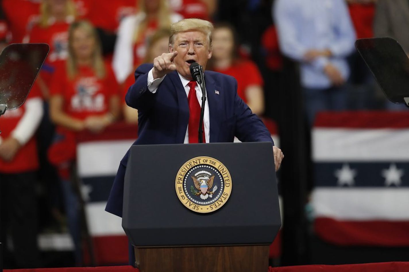 President Donald Trump addresses supporters during a campaign rally at the Target Center in Minneapolis on Thursday, Oct. 10, 2019.