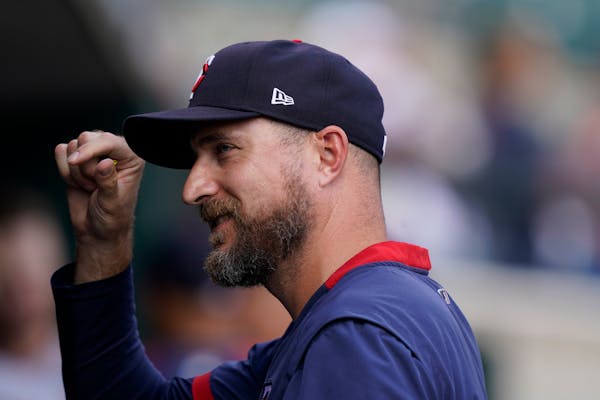 Minnesota Twins manager Rocco Baldelli walks in the dugout during the ninth inning of a baseball game against the Detroit Tigers, Monday, Aug. 30, 202