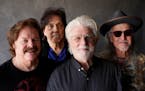 Members of the Doobie Brothers, from left, Tom Johnston, John McFee, Michael McDonald and Pat Simmons pose for a portrait at Show Biz Studios in Los A