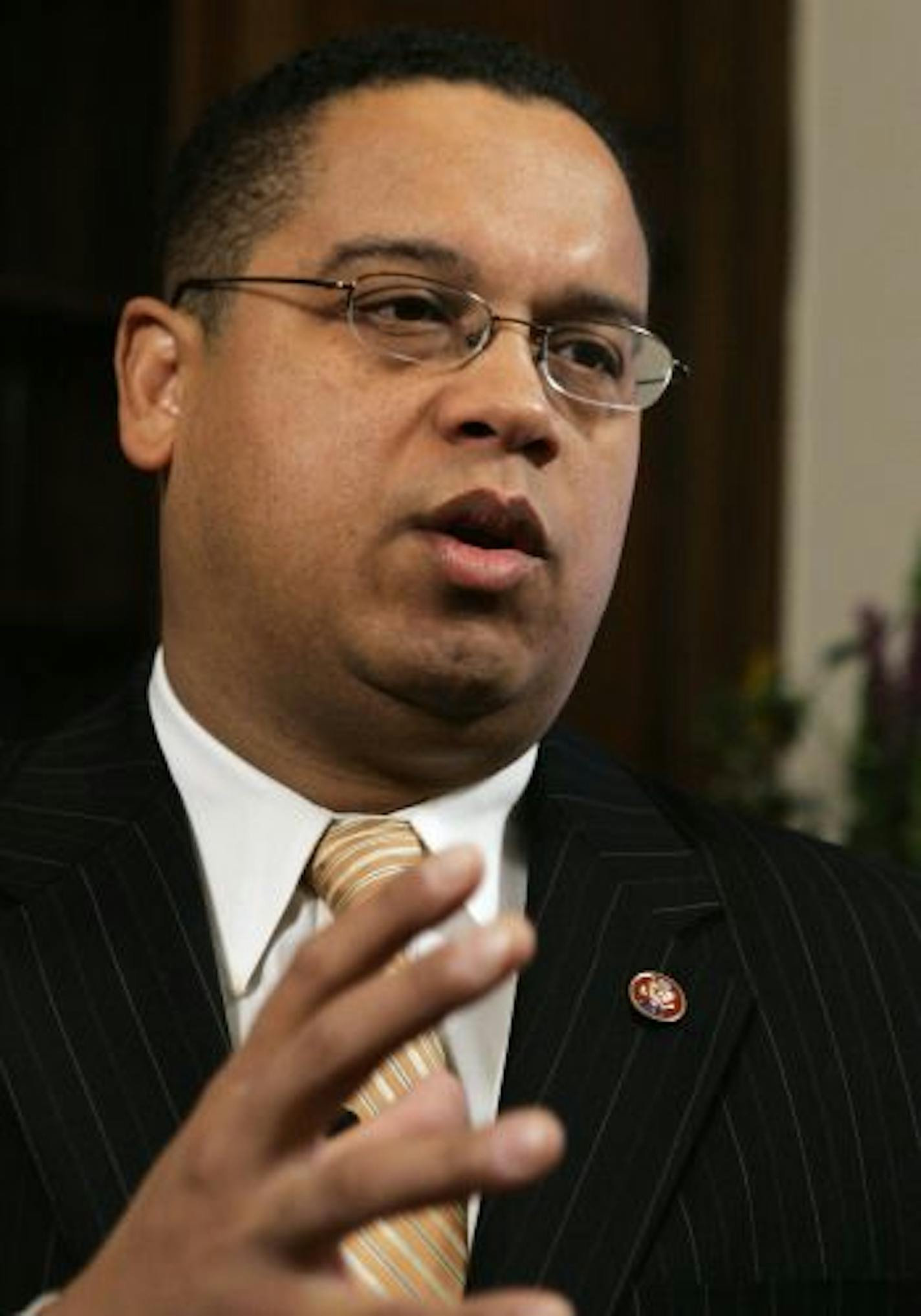 Rep. Keith Ellison, D-Minn., gestures during an interview with The Associated Press on Capitol Hill in Washington, Tuesday, Jan. 9, 2007.