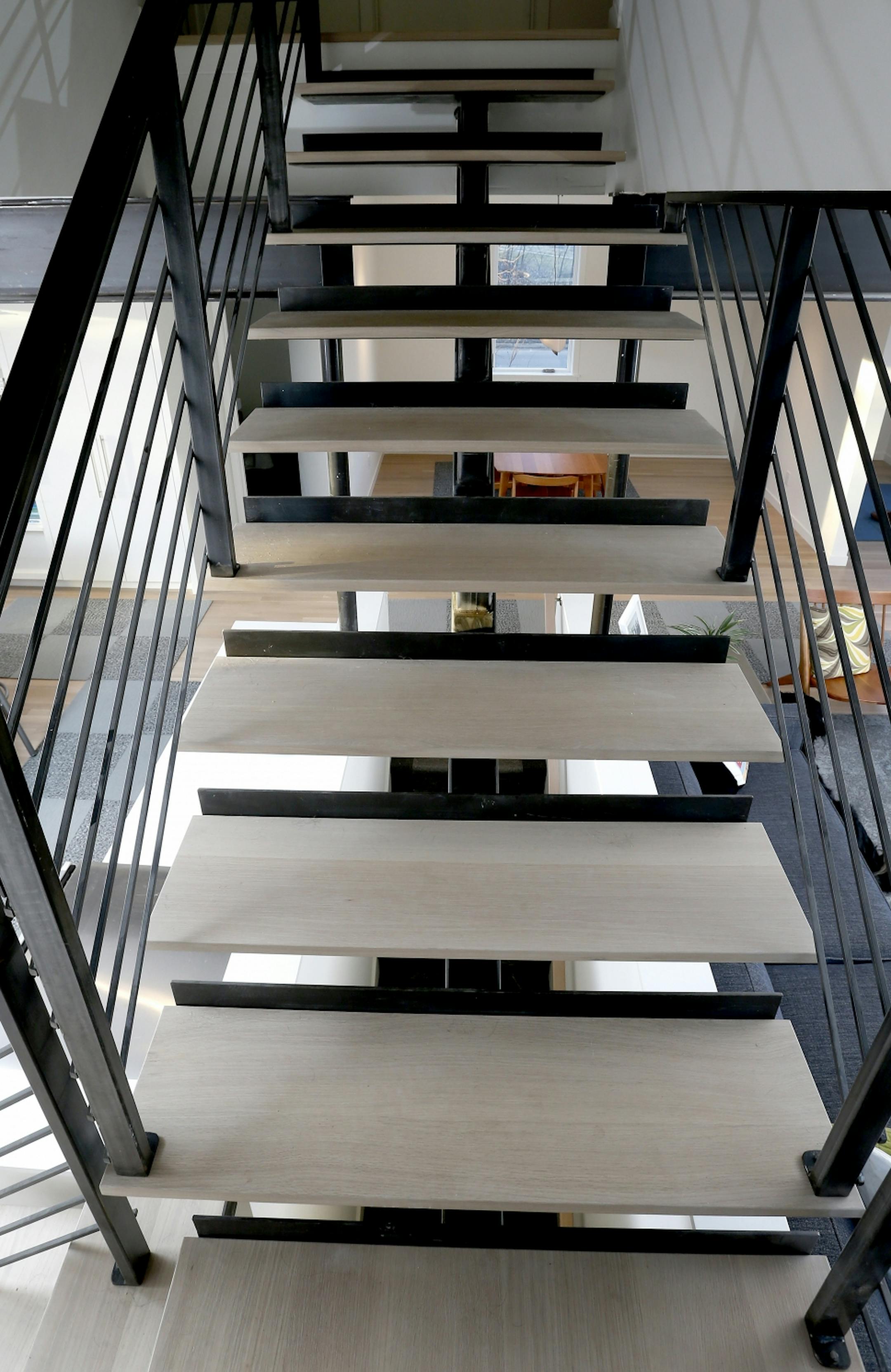 The home has a free-standing staircase.