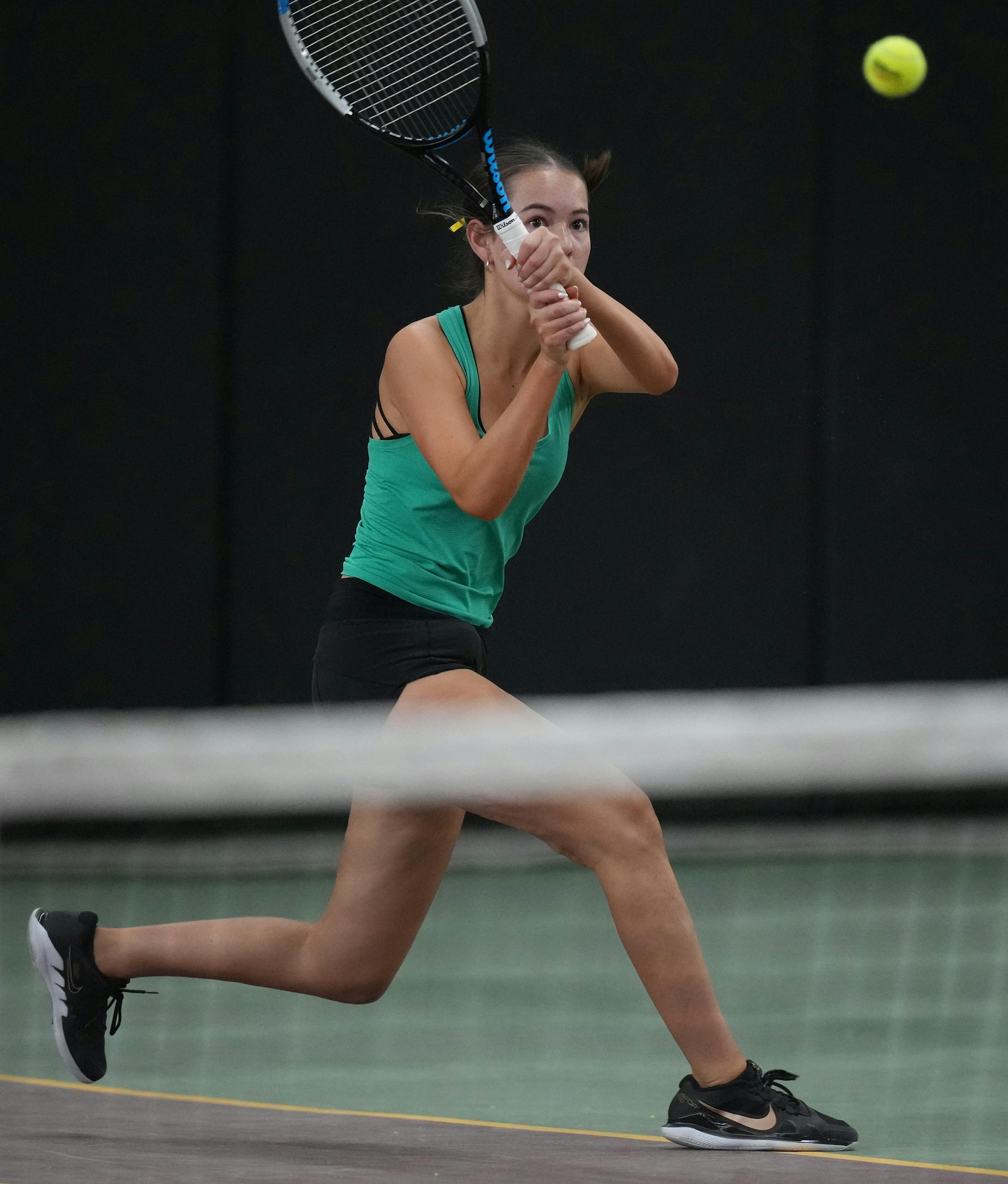 Aoife Loftus of Mayo returns a volley on the way to beating Astrid Kerrman of Edina at the Baseline Tennis Center in Minneapolis, Minnesota on Wednesday, Oct. 25, 2023.