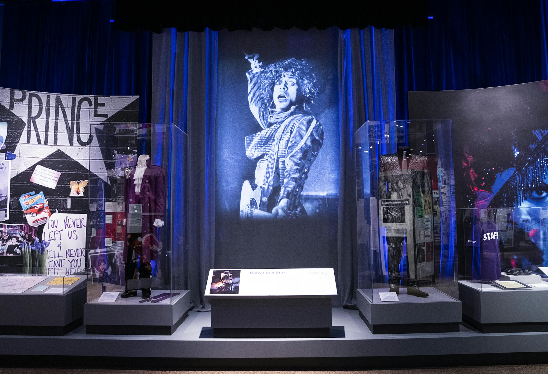 The History Center show includes an exhibit on Prince and "Purple Rain," which was filmed at the club. The image projected at center was shot by Star Tribune photographer David Brewster at the 1983 concert where Prince debuted — and recorded — many of the songs for the film.