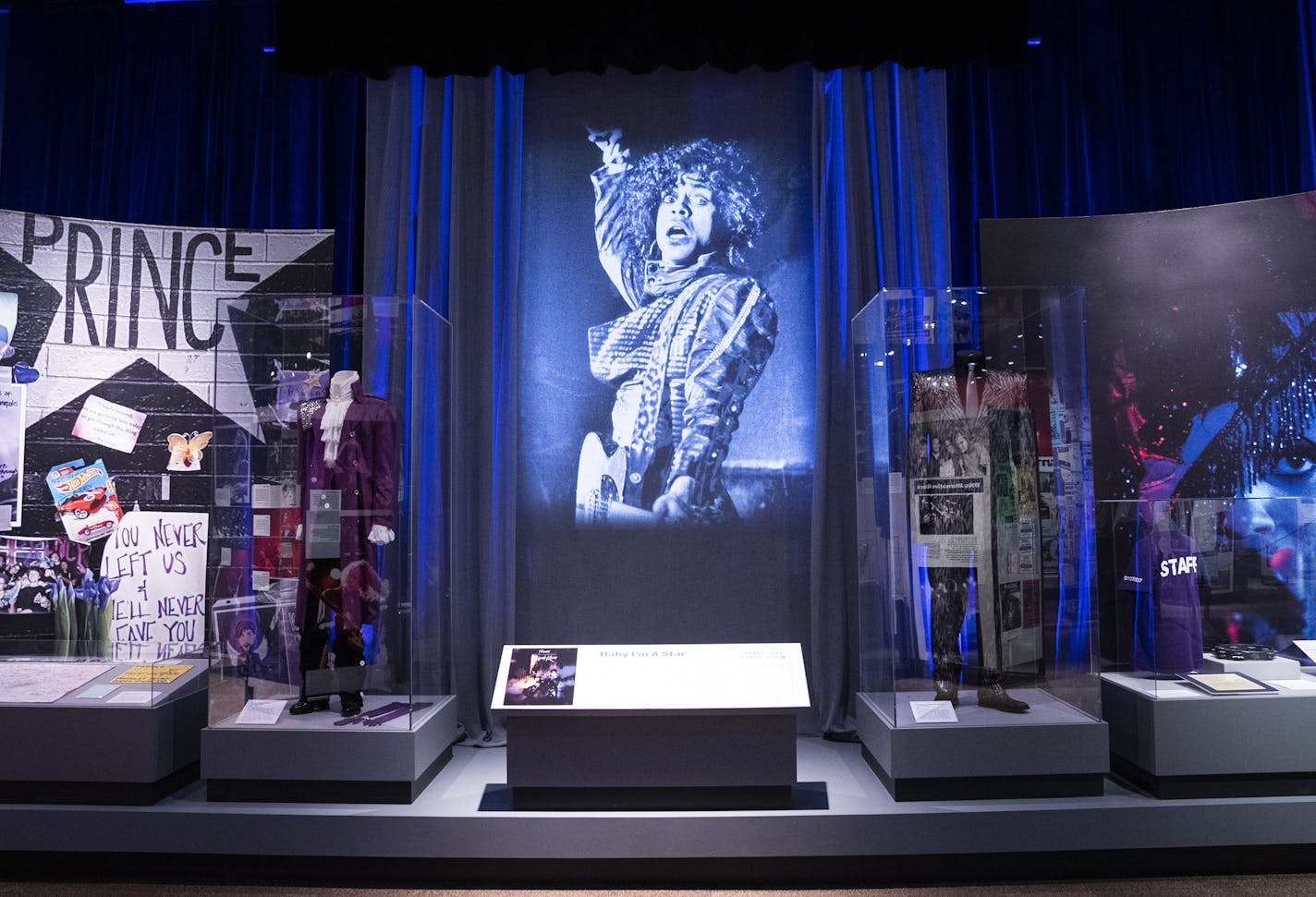 The History Center show includes an exhibit on Prince and "Purple Rain," which was filmed at the club. The image projected at center was shot by Star Tribune photographer David Brewster at the 1983 concert where Prince debuted — and recorded — many of the songs for the film.