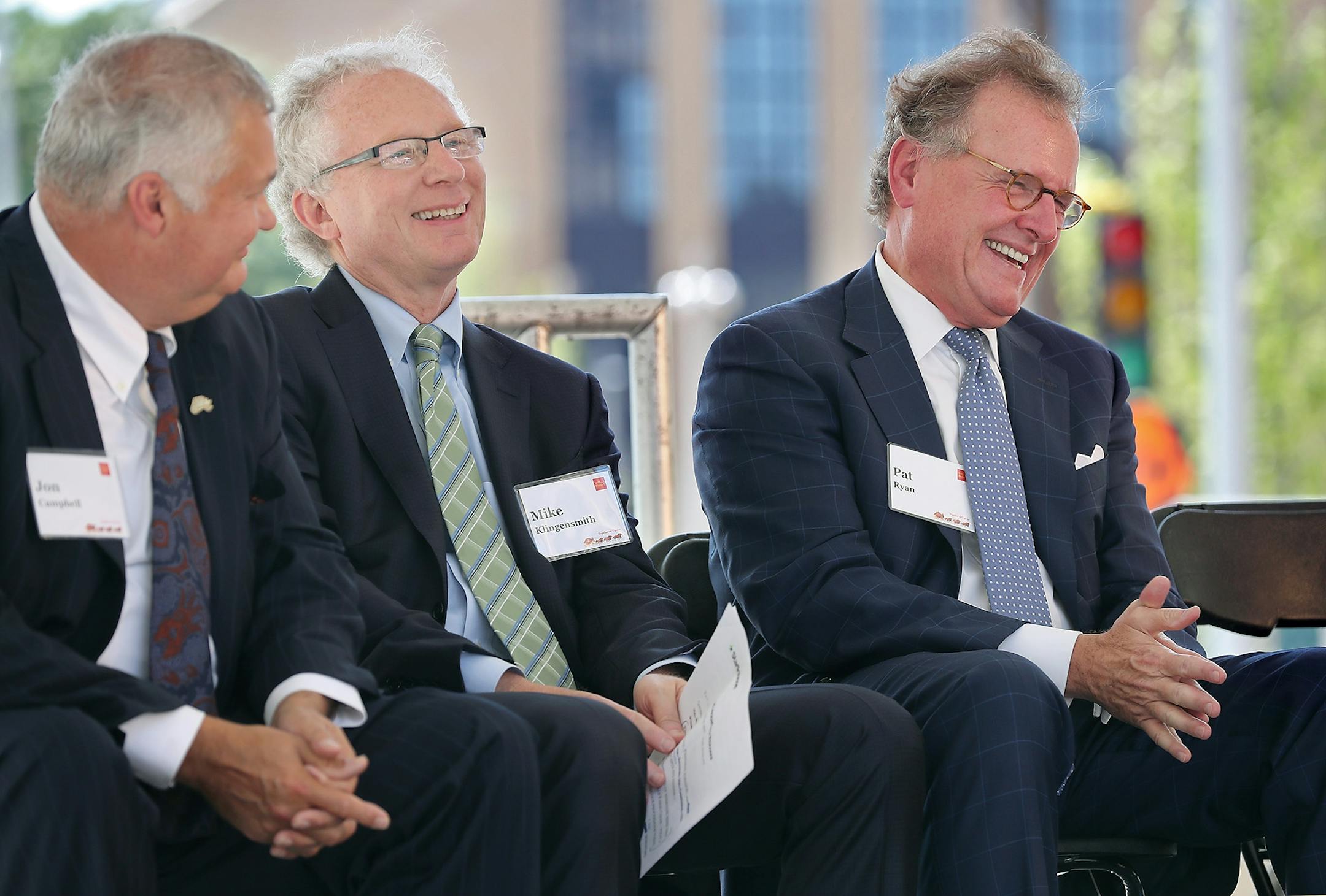 Executive Vice President and director of Government and Community Relations for Wells Fargo & Company Jon Campbell, left, Star Tribune Publisher and CEO Mike Klingensmith, center, and Ryan Companies President and CEO Pat Ryan, celebrated the grand opening of Minneapolis East Town Towers, Wednesday, July 20, 2016 in downtown Minneapolis, MN.