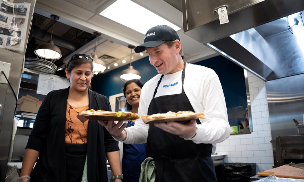 Rep. Dean Phillips made pizzas at an “on-the-job” event at Pizza Karma in Eden Prairie in 2022.
