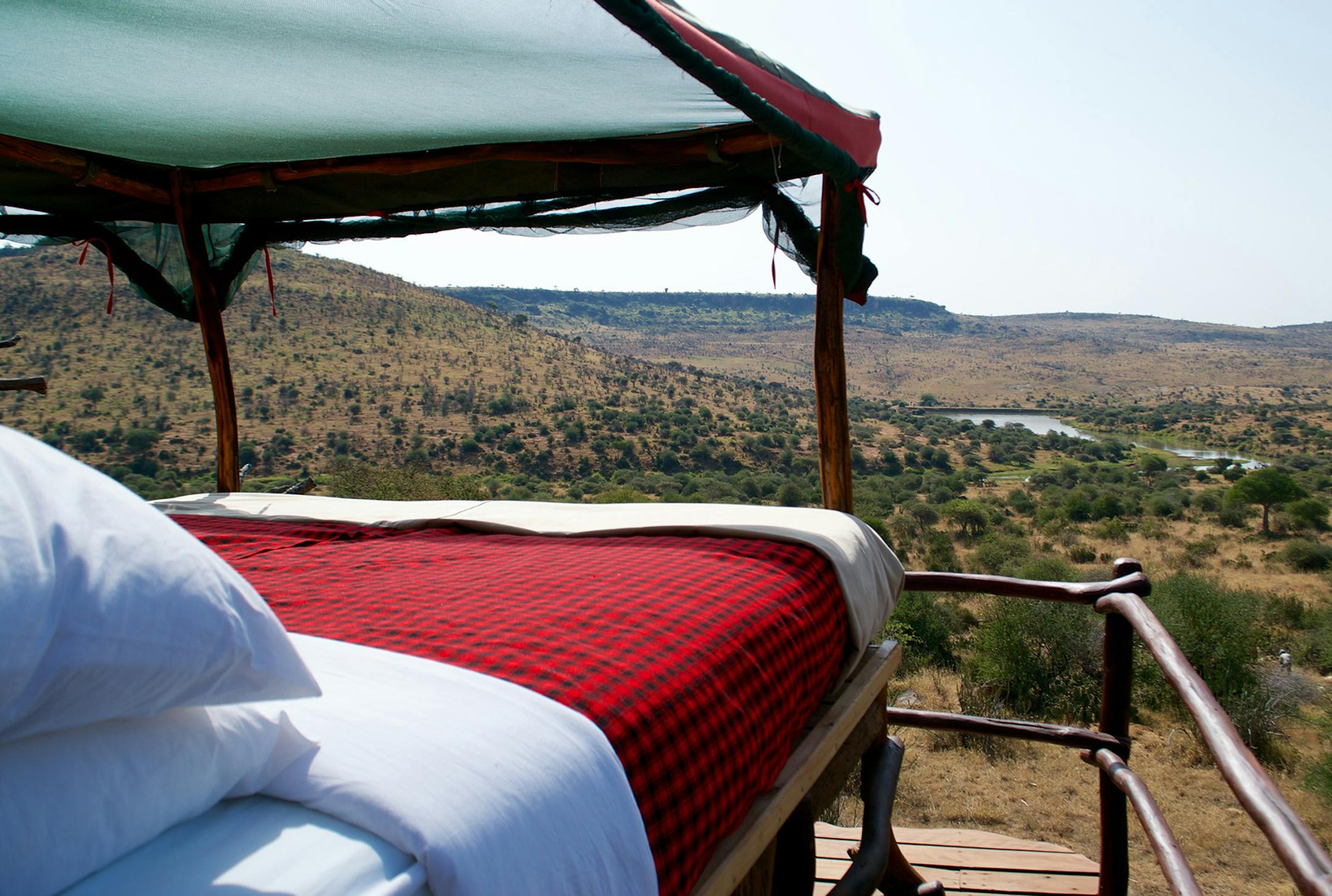 Loisaba Conservancy's star beds feature handmade four-poster beds with nothing between you and the open sky except for diaphanous mosquito netting. (Loisaba Conservancy/TNS)