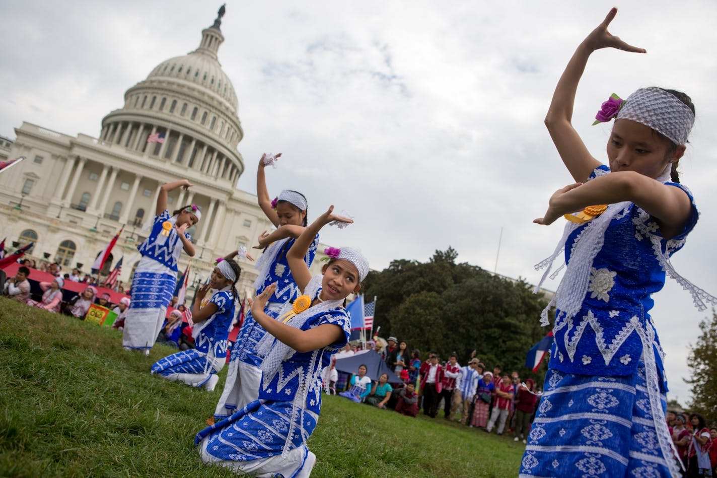 A troupe performs a traditional Karen dance as members of the Karen ethnic group rally to bring attention to the human rights violations towards religious and ethnic minorities in the Burma region, in front of the U.S. Capitol building on Capitol Hill in Washington, D.C., November 6, 2017. As resettlement of Karen refugees to the United States winds down, advocacy efforts have increased in support of more than 120,000 Karen who remain in Thai refugee camps.