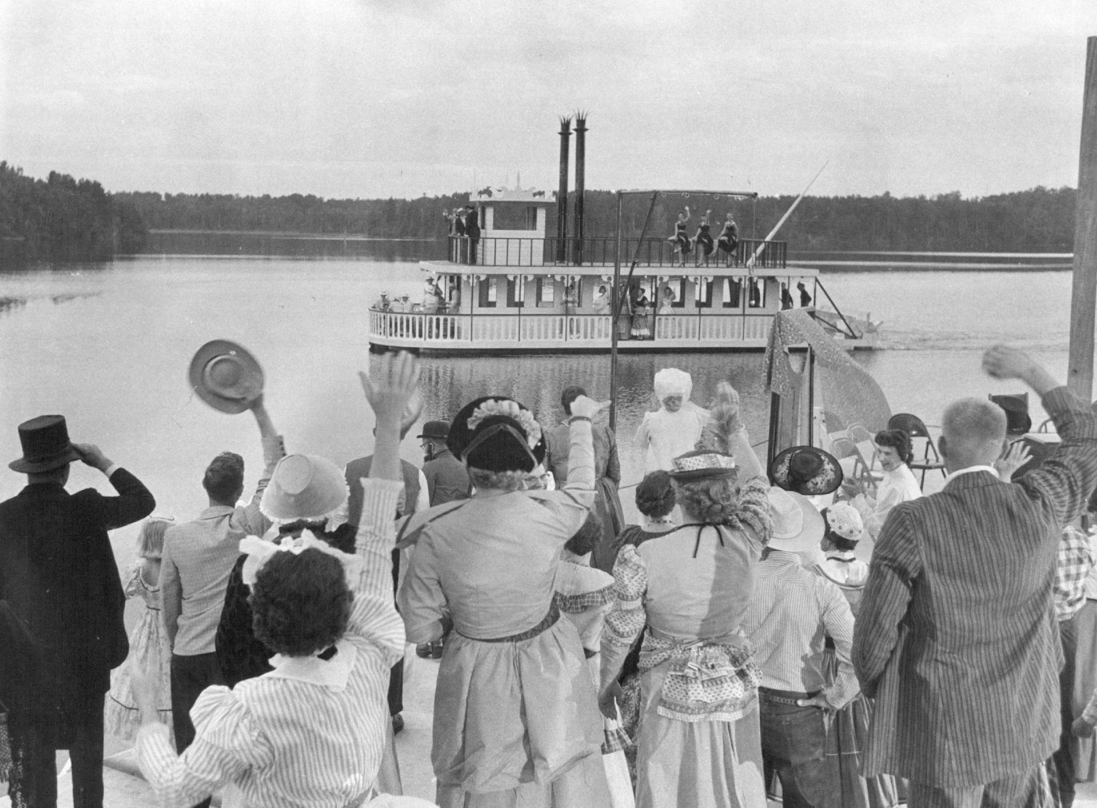 August 18, 1957 THE OLDTIME showboat has returned to the Mississippi river as an ambitious civic project in Grand Rapids, Minn. The boat, built to represent a stern wheeler but actually powered by two out-board motors, has rounded the bend three times this summer to bring "Mississippi Melodie II" to a riverside platform at Grand Rapids. One more performance, at 8:45 p.m. Saturday, remains on this year's schedule for the gaily-costumed cast of nearly 100. Earl Seubert, Minneapolis Sunday Tribune;
