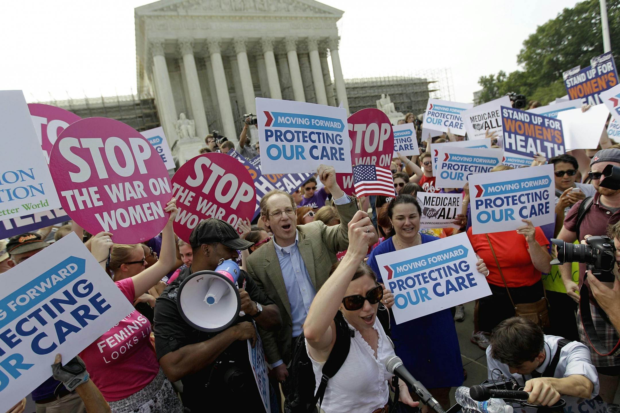Supporters of the health care law celebrated on Thursday outside the Supreme Court in Washington after the ruling. President Obama called it "a victory for people all over this country."