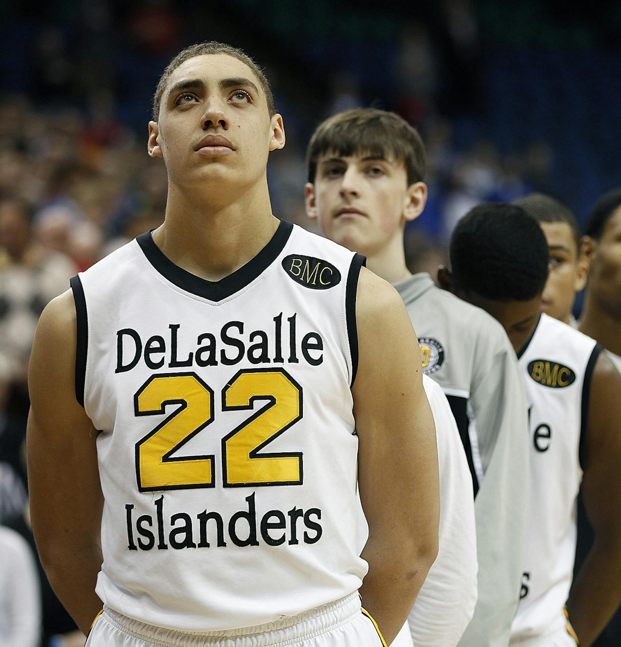 DeLaSalle's Reid Travis led his team in the National Anthem at the boys' basketball Class 3A semifinals at the Target Center, Thursday, March 21, 2013 in Minneapolis, MN. (ELIZABETH FLORES/STAR TRIBUNE) ELIZABETH FLORES ¬• eflores@startribune.com ORG XMIT: MIN1303211327022912 ORG XMIT: MIN1306171150087719