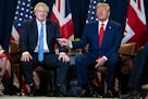 FILE -- Prime Minister Boris Johnson of Britain, left, meets with President Donald Trump during the United Nations General Assembly at U.N. headquarte